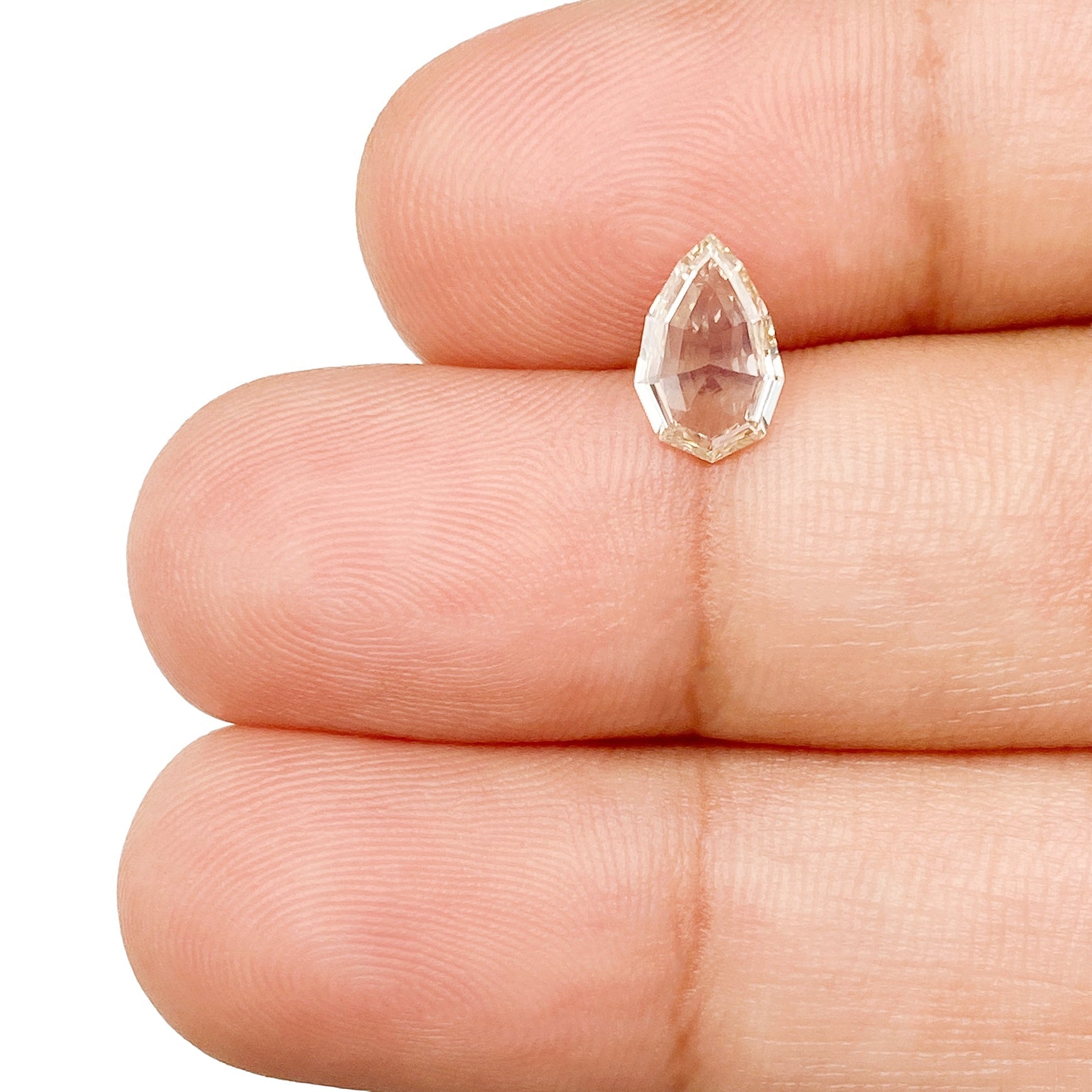 DIAMOND VAULT CHAMPAGNE & COGNAC DIAMOND 0.65ct | Champagne VVS Pear Shape Step Cut Diamond