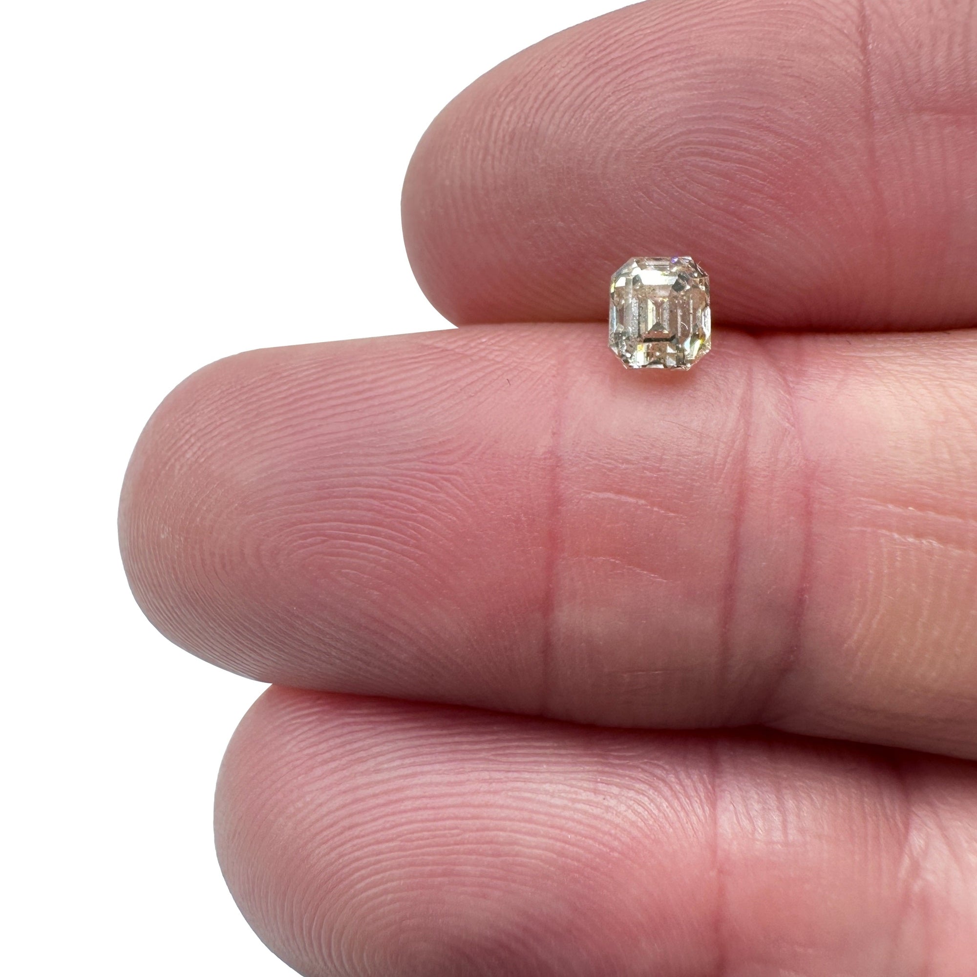 DIAMOND VAULT CHAMPAGNE & COGNAC DIAMOND 0.71ct | Champagne SI Emerald Shape Step Cut Diamond