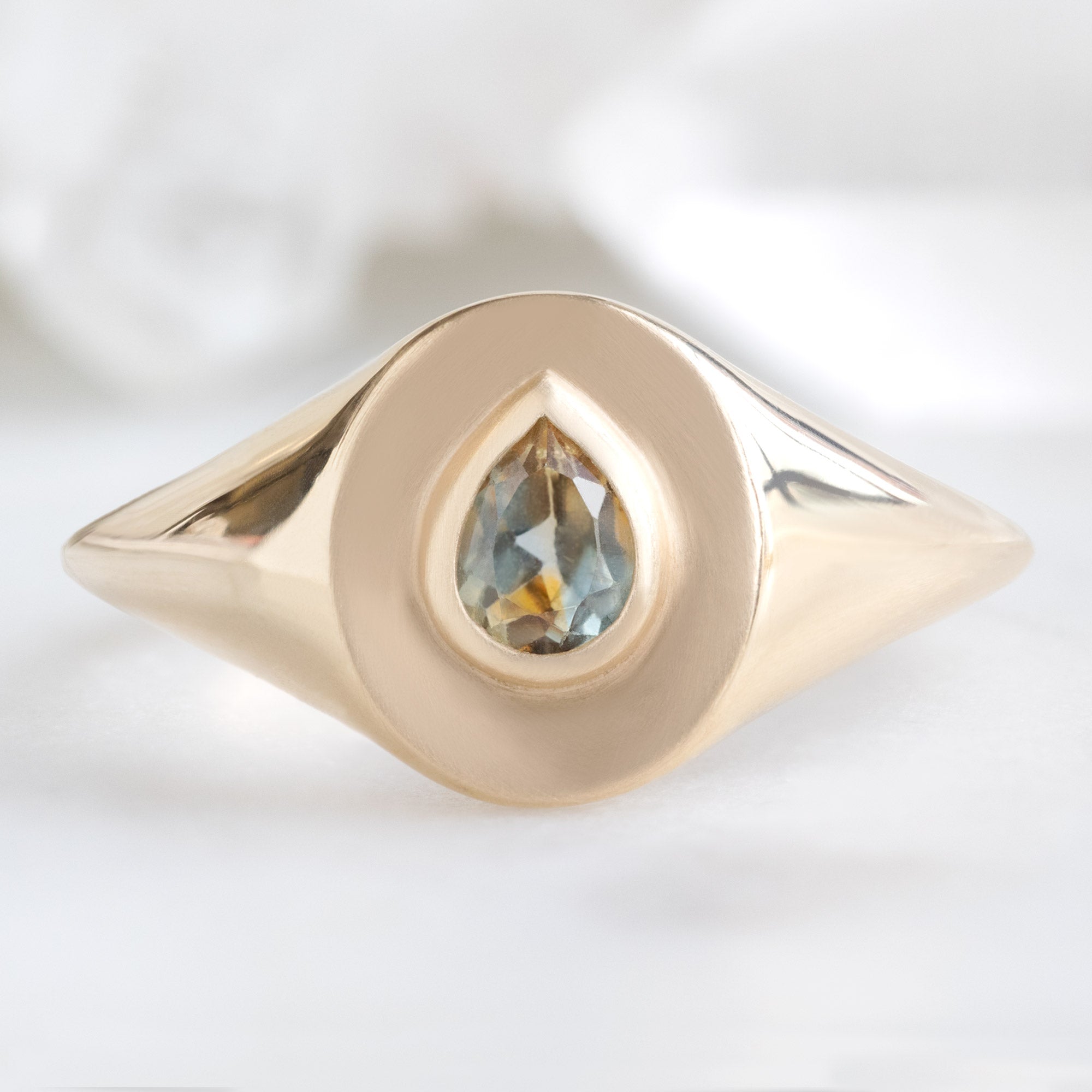 Alexis Russell Engagement Rings The Signet Ring | 0.60ct Pear Montana Sapphire in 10K Yellow Gold