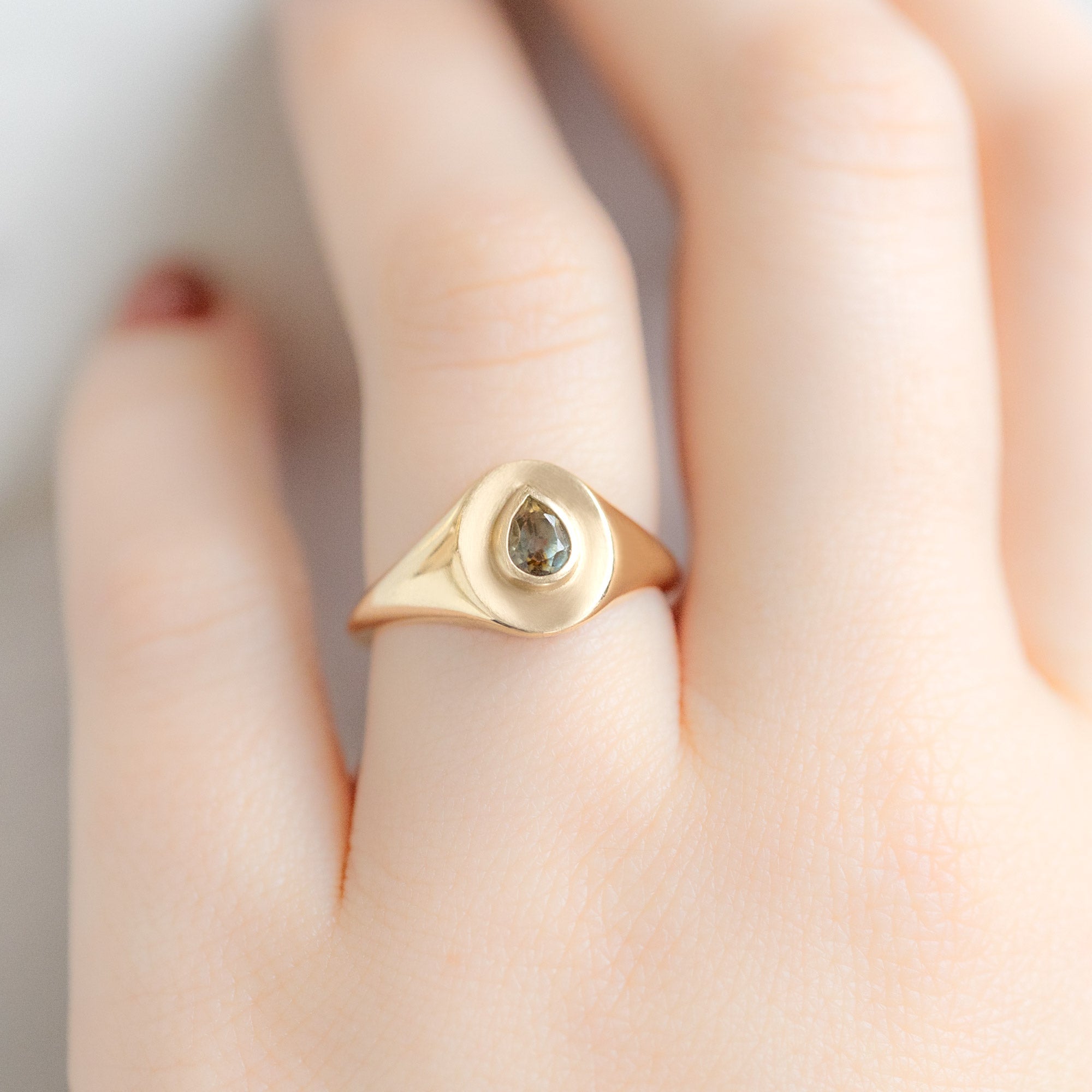 Alexis Russell Engagement Rings The Signet Ring | 0.60ct Pear Montana Sapphire in 10K Yellow Gold