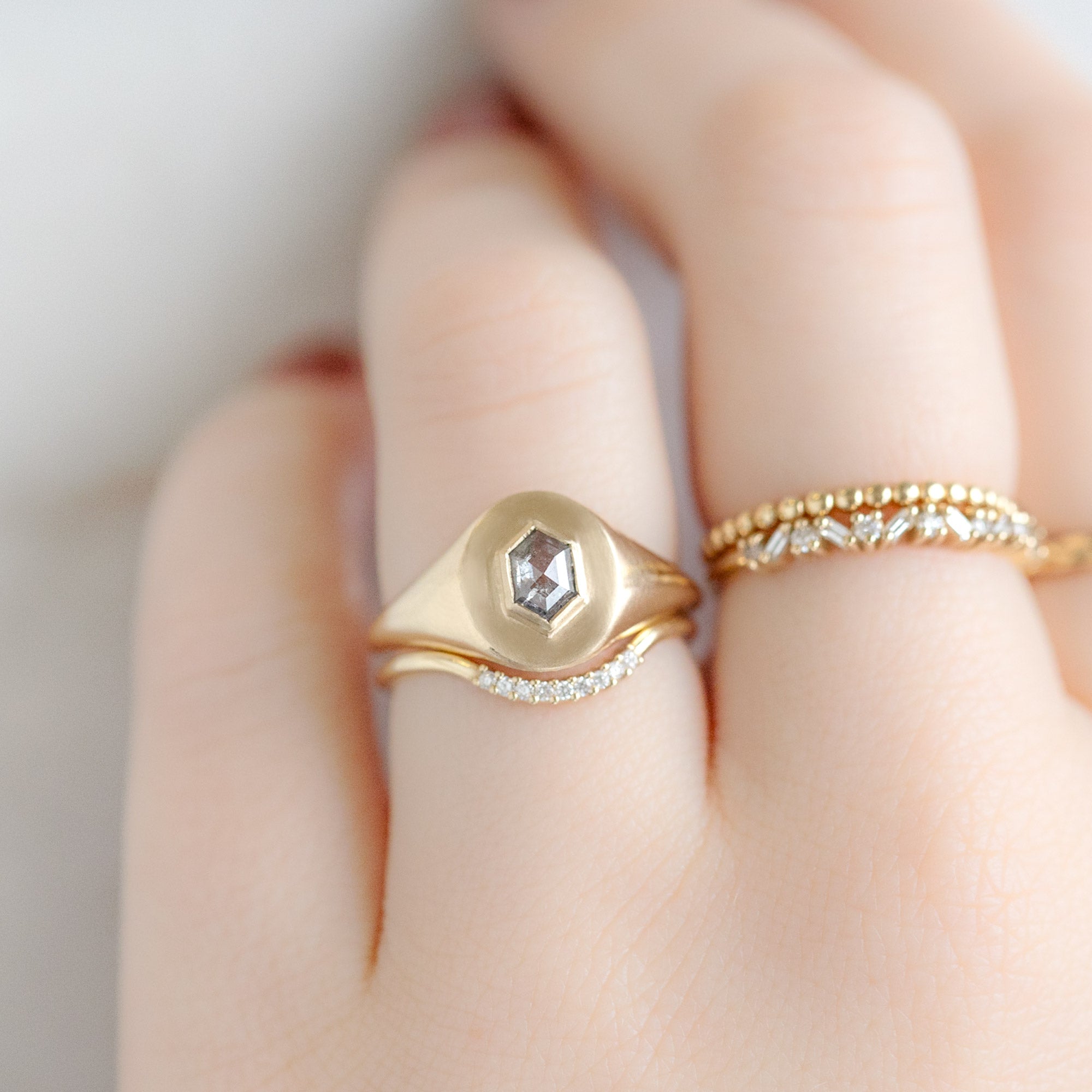 buy:the-signet-ring-0-38ct-hexagon-salt-and-pepper-diamond-in-10k-yellow-gold,white-diamond-pave-arc-stacking-band-14k-or-18k-yellow-gold