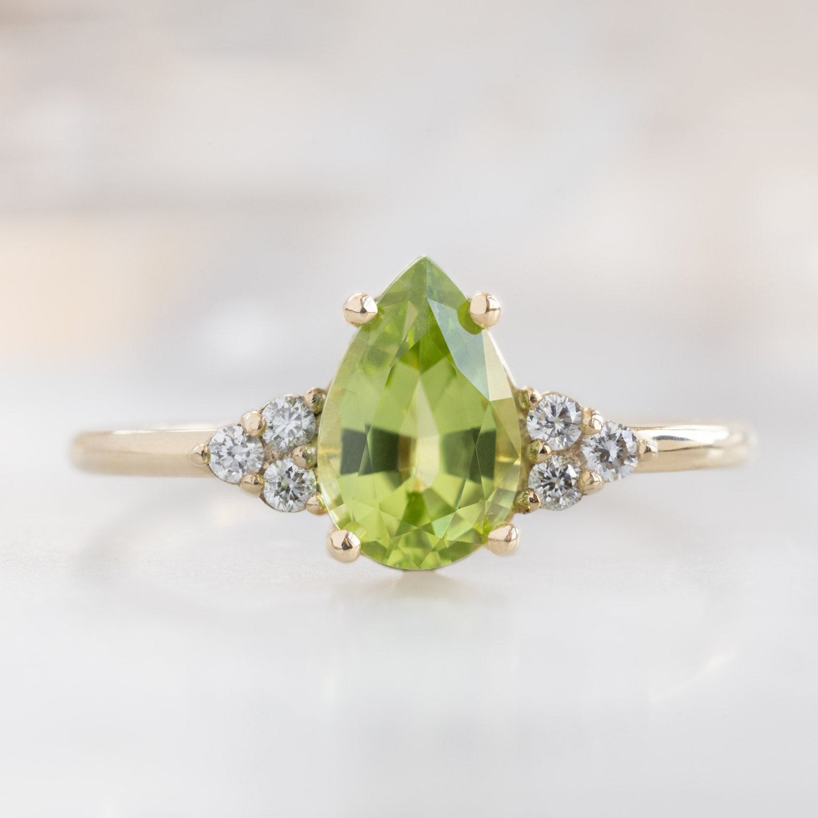 Alexis Russell Engagement Rings The Ivy Ring | 0.85ct Pear Peridot in 14K Yellow Gold