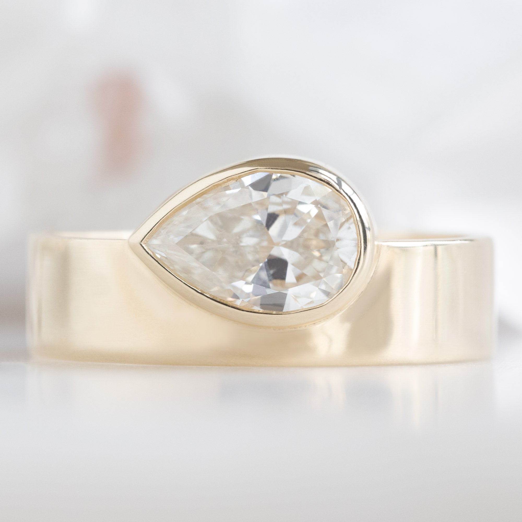 Alexis Russell Engagement Rings The Cigar Band | 0.91ct Pear Natural White Diamond in 14K Yellow Gold