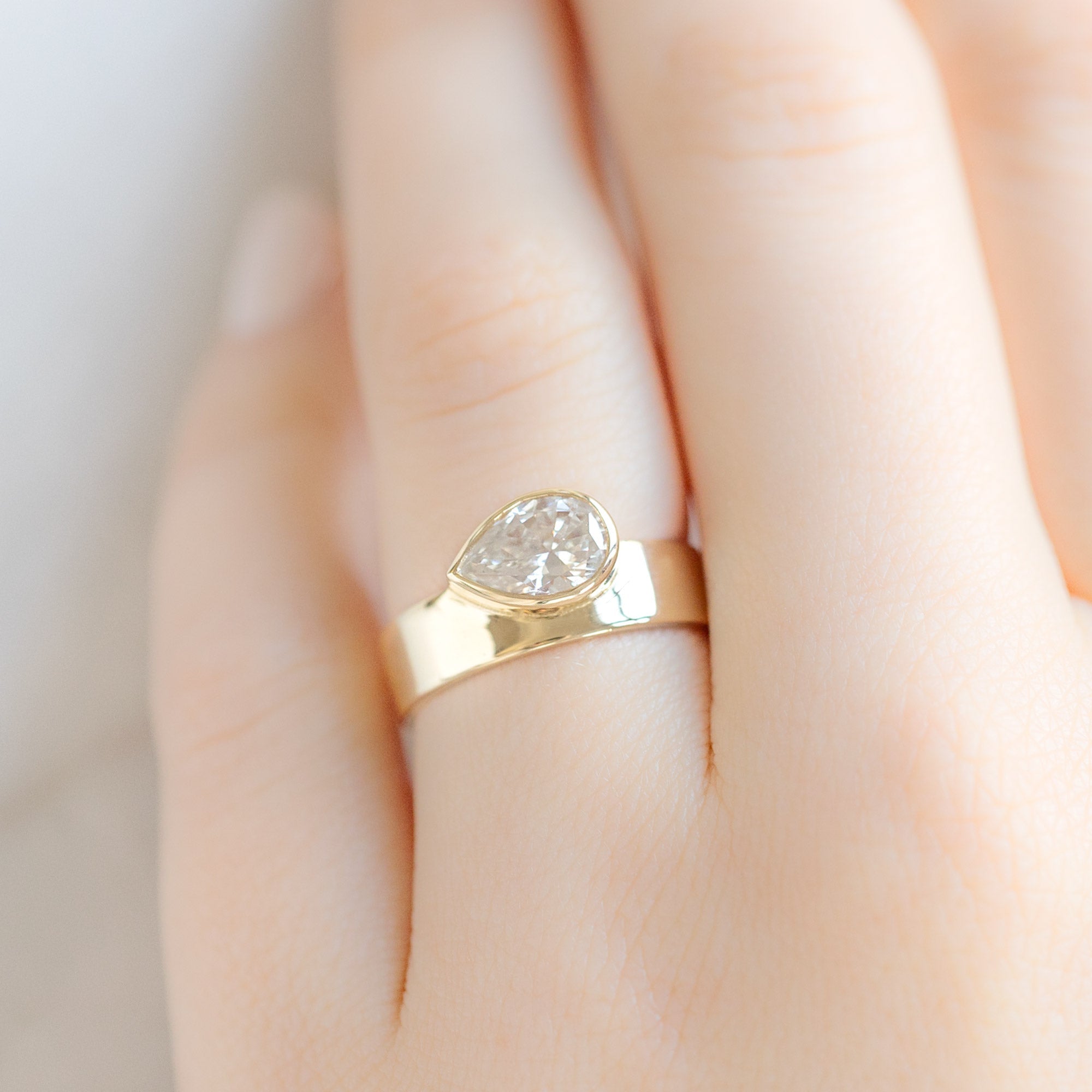 Alexis Russell Engagement Rings The Cigar Band | 0.91ct Pear Natural White Diamond in 14K Yellow Gold