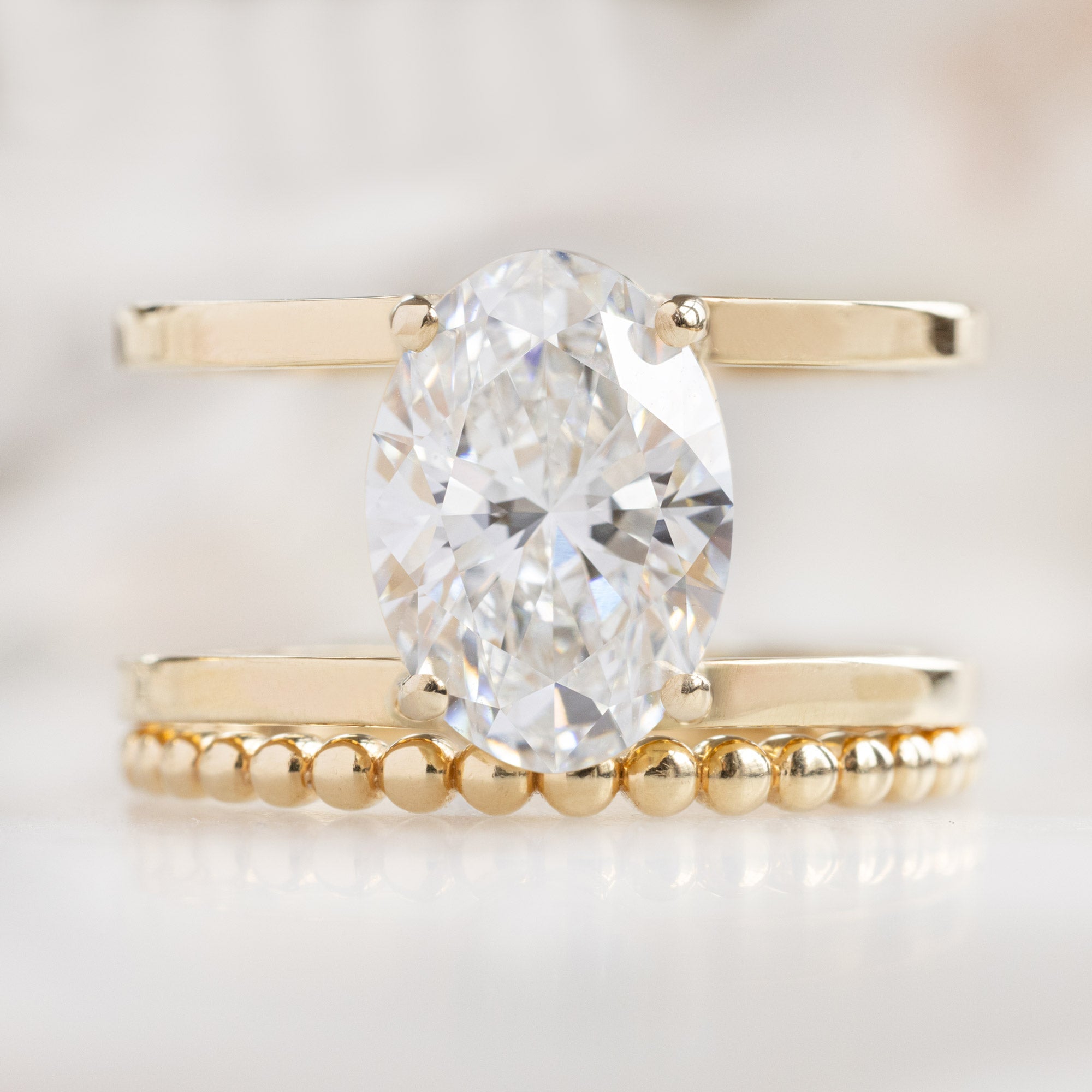 Alexis Russell Engagement Rings The Poppy Ring | 2.15ct Lab Grown Oval White Diamond in 14K Yellow Gold
