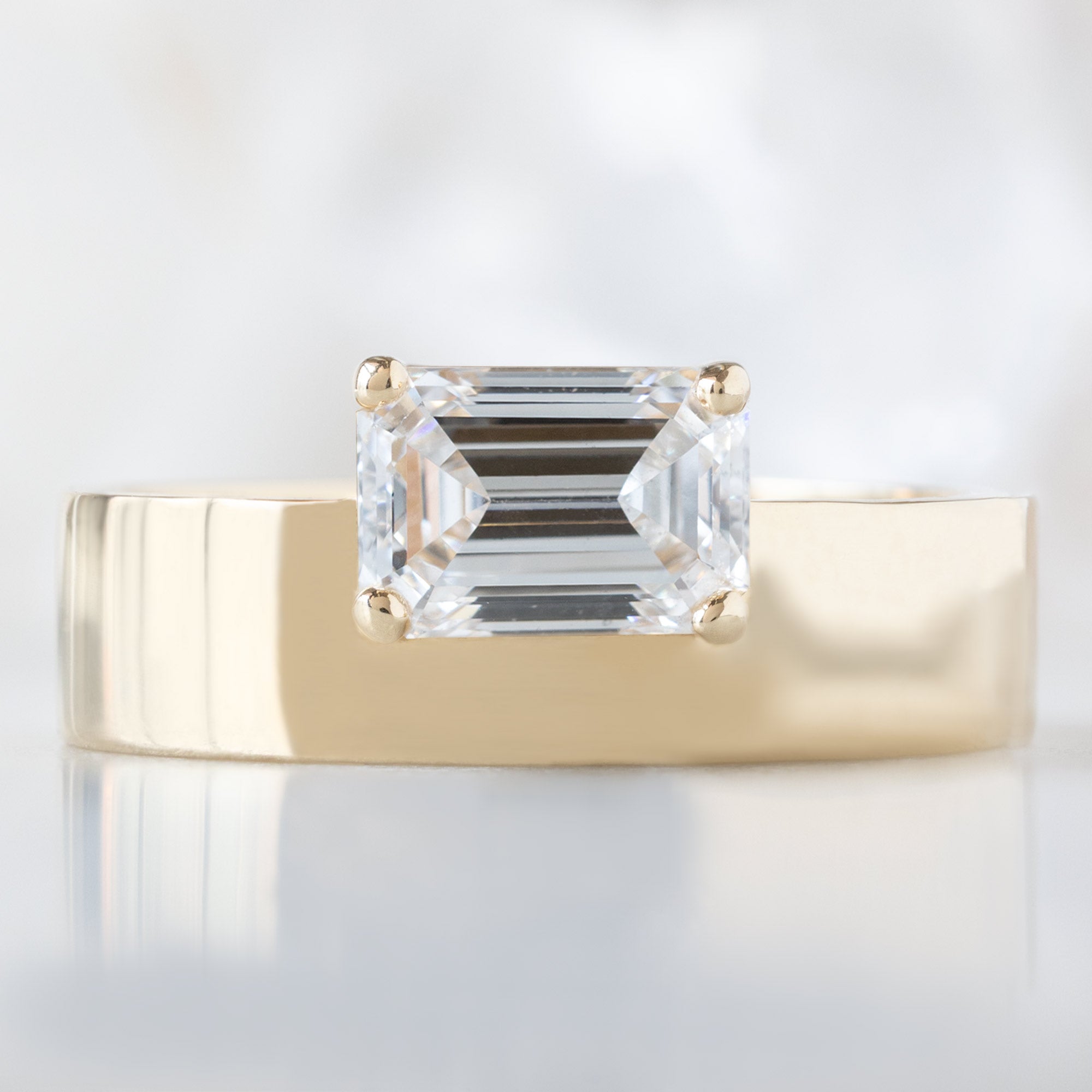 Alexis Russell Engagement Rings The Cigar Band | with a 0.90ct Lab Grown Emerald-Cut White Diamond in 14K Yellow Gold