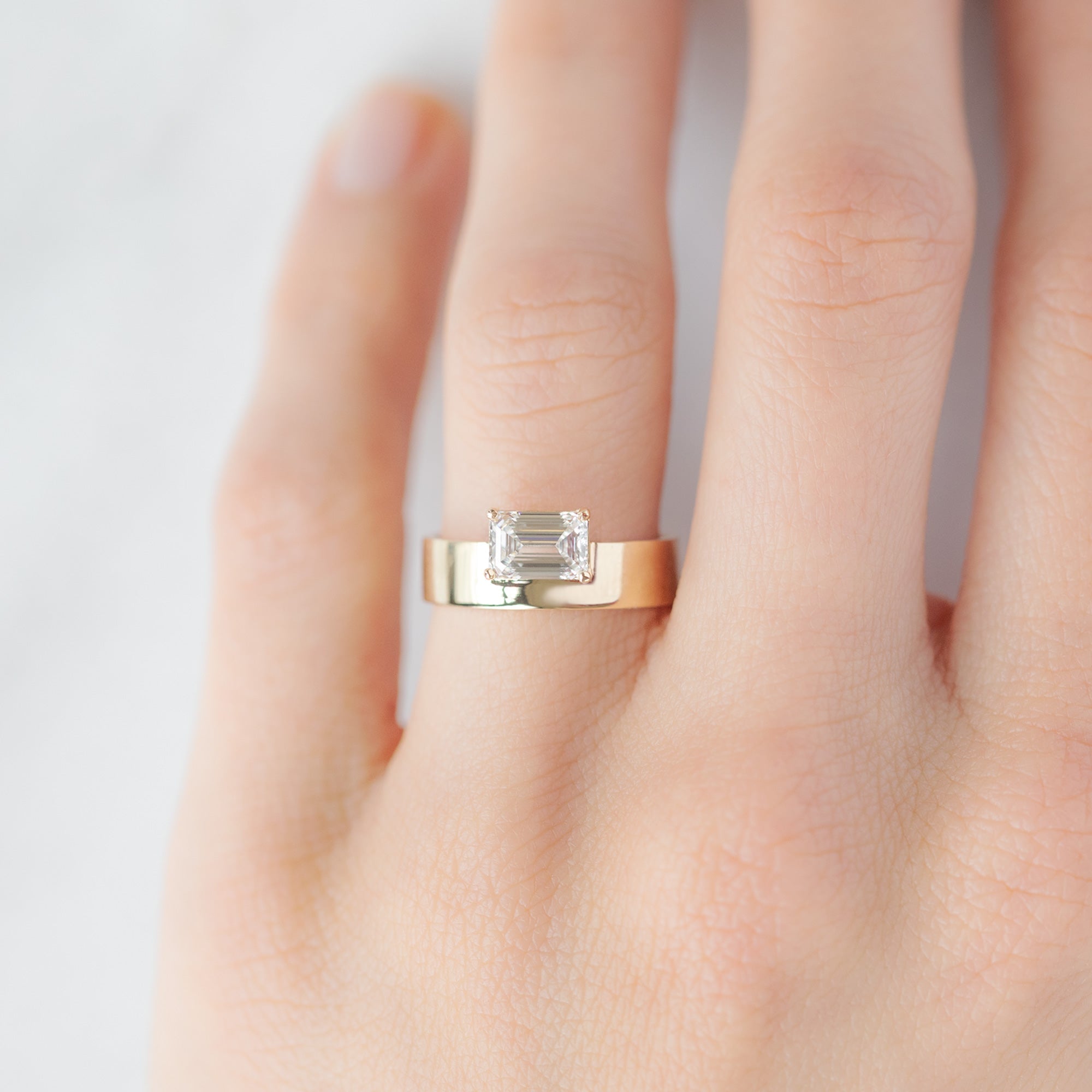 Alexis Russell Engagement Rings The Cigar Band | 0.90ct Lab Grown Emerald-Cut White Diamond in 14K Yellow Gold