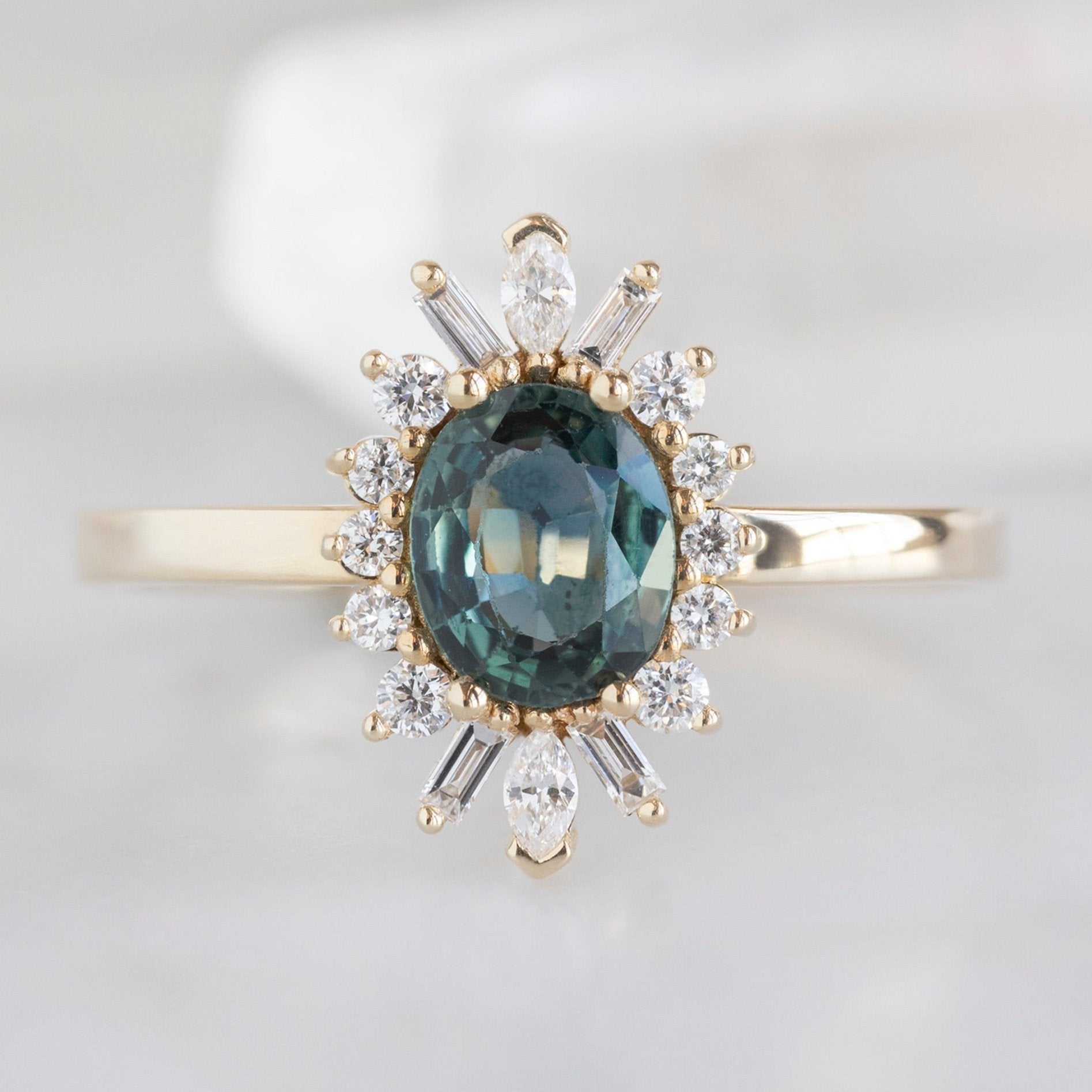 Alexis Russell Engagement Rings The Camellia Ring | 0.72ct Oval Blue Sapphire in 14K Yellow Gold