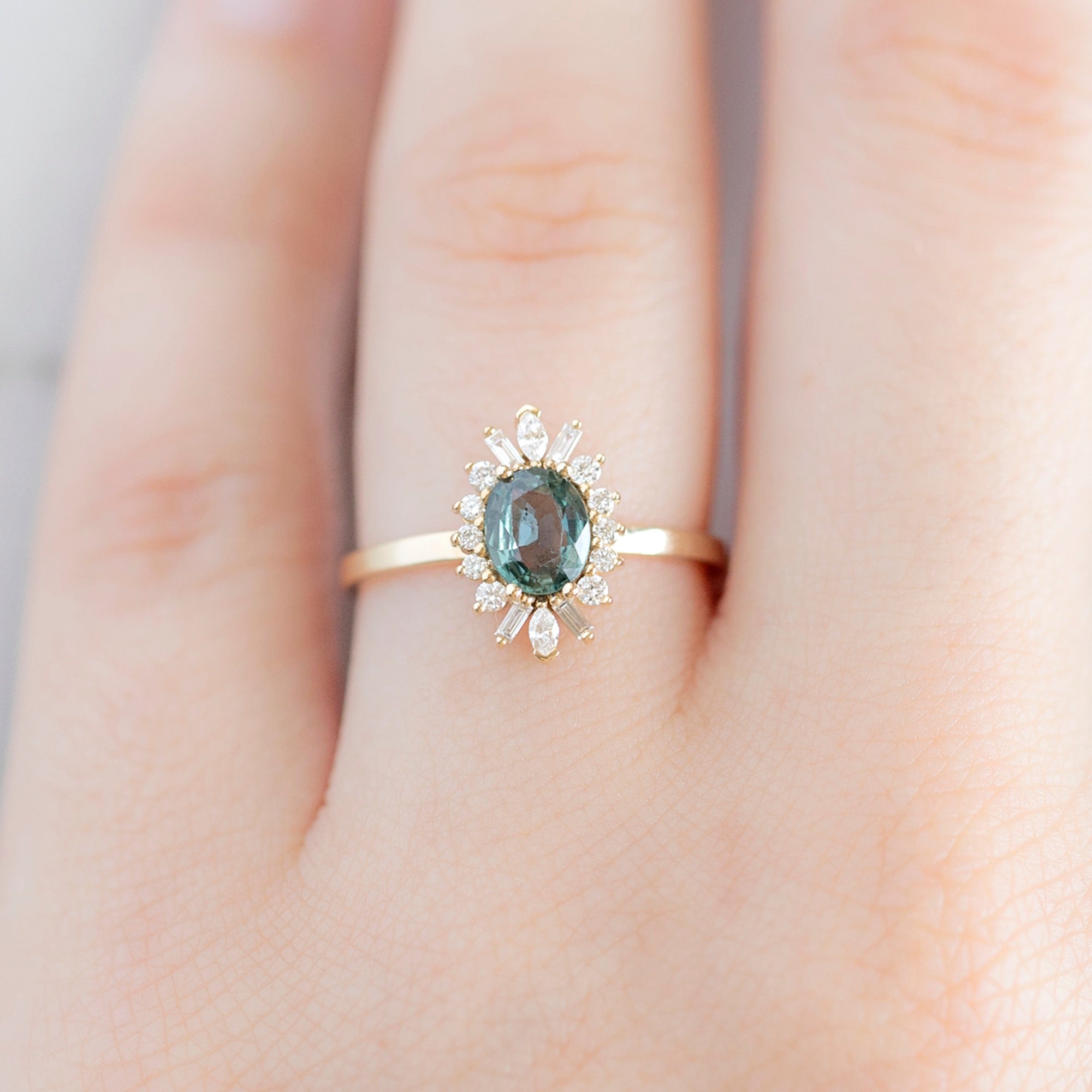 Alexis Russell Engagement Rings The Camellia Ring | 0.72ct Oval Blue Sapphire in 14K Yellow Gold