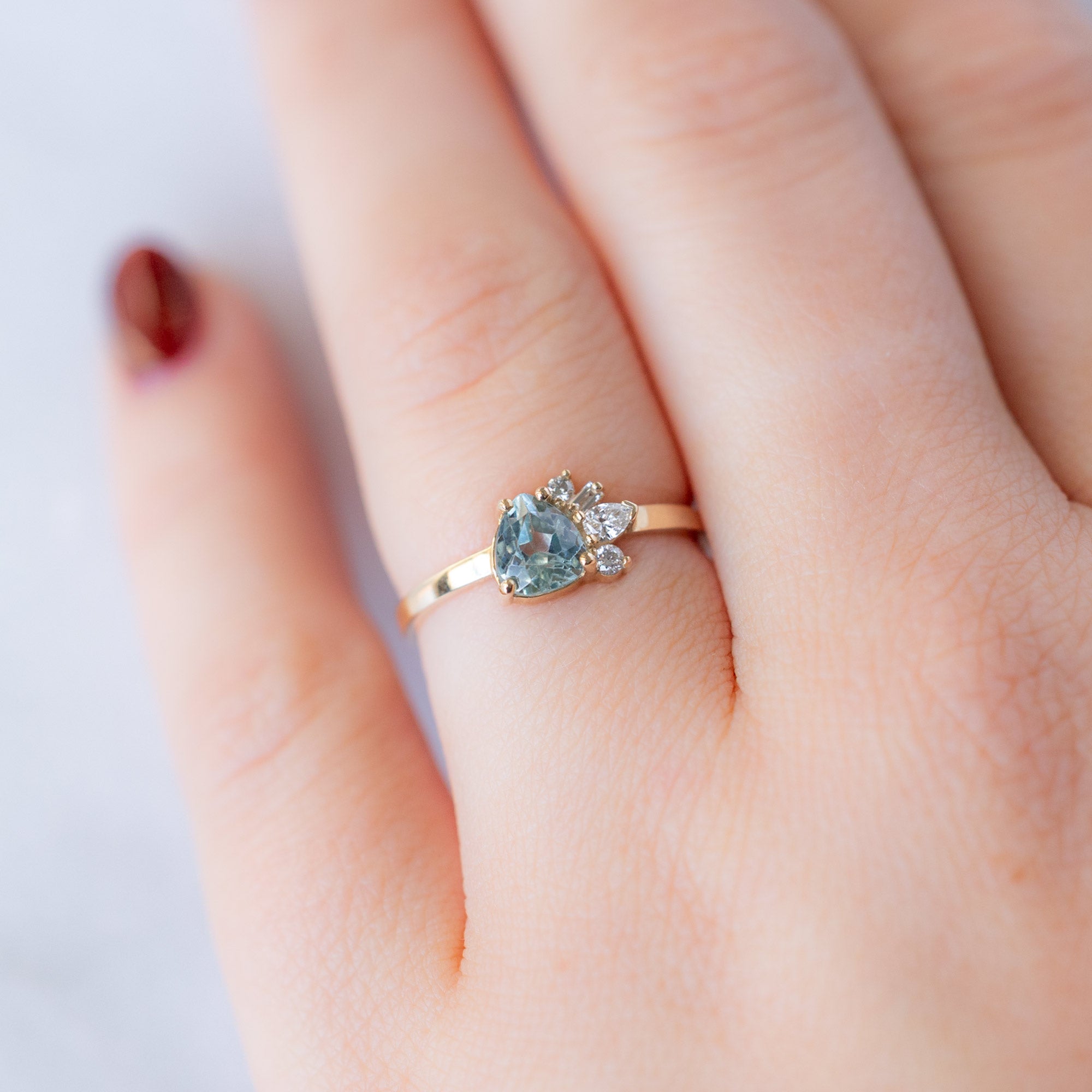 Alexis Russell Engagement Rings The Cluster Ring | 0.84ct Pear Cut Montana Sapphire in 14K Yellow Gold