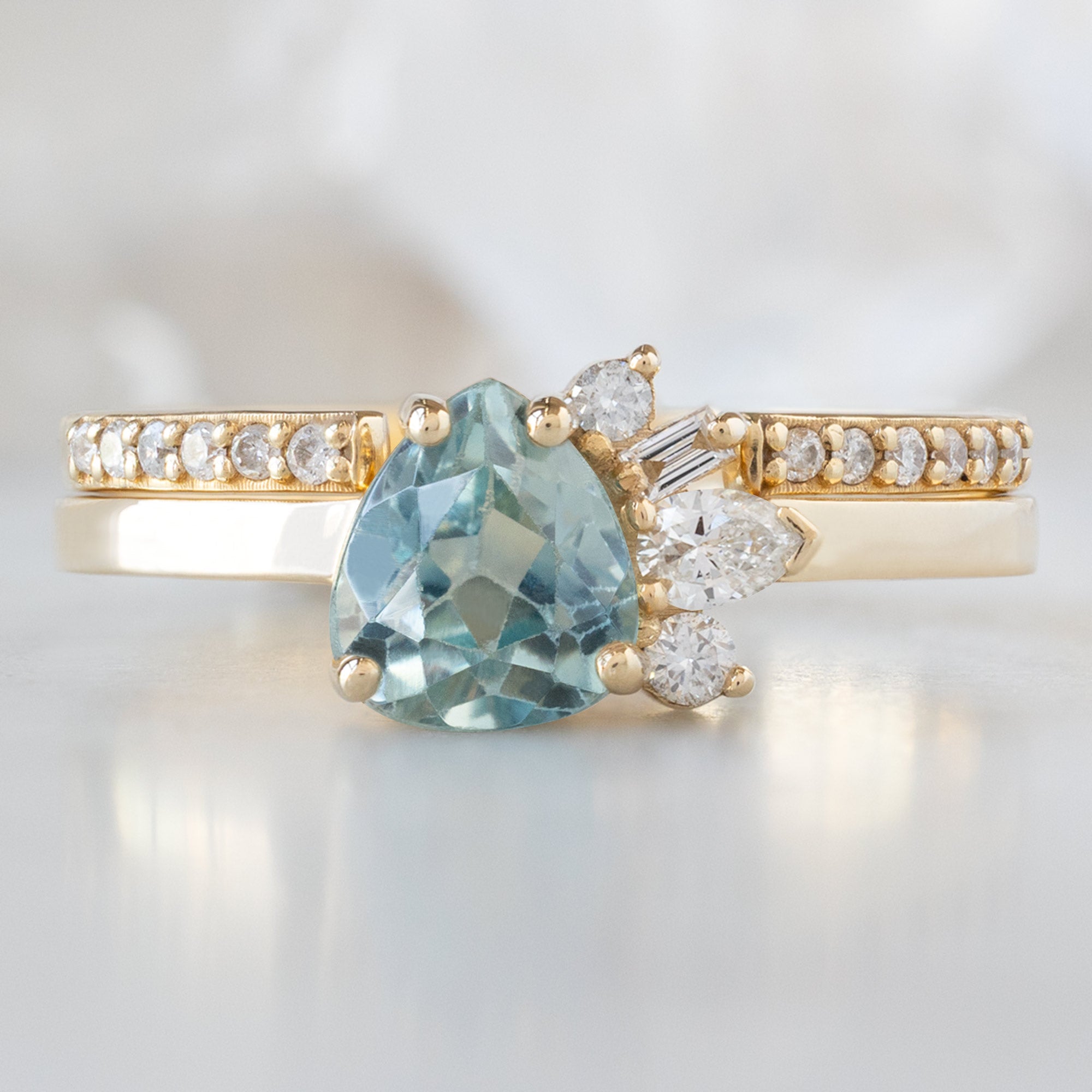 Alexis Russell Engagement Rings The Cluster Ring | 0.84ct Pear Cut Montana Sapphire in 14K Yellow Gold