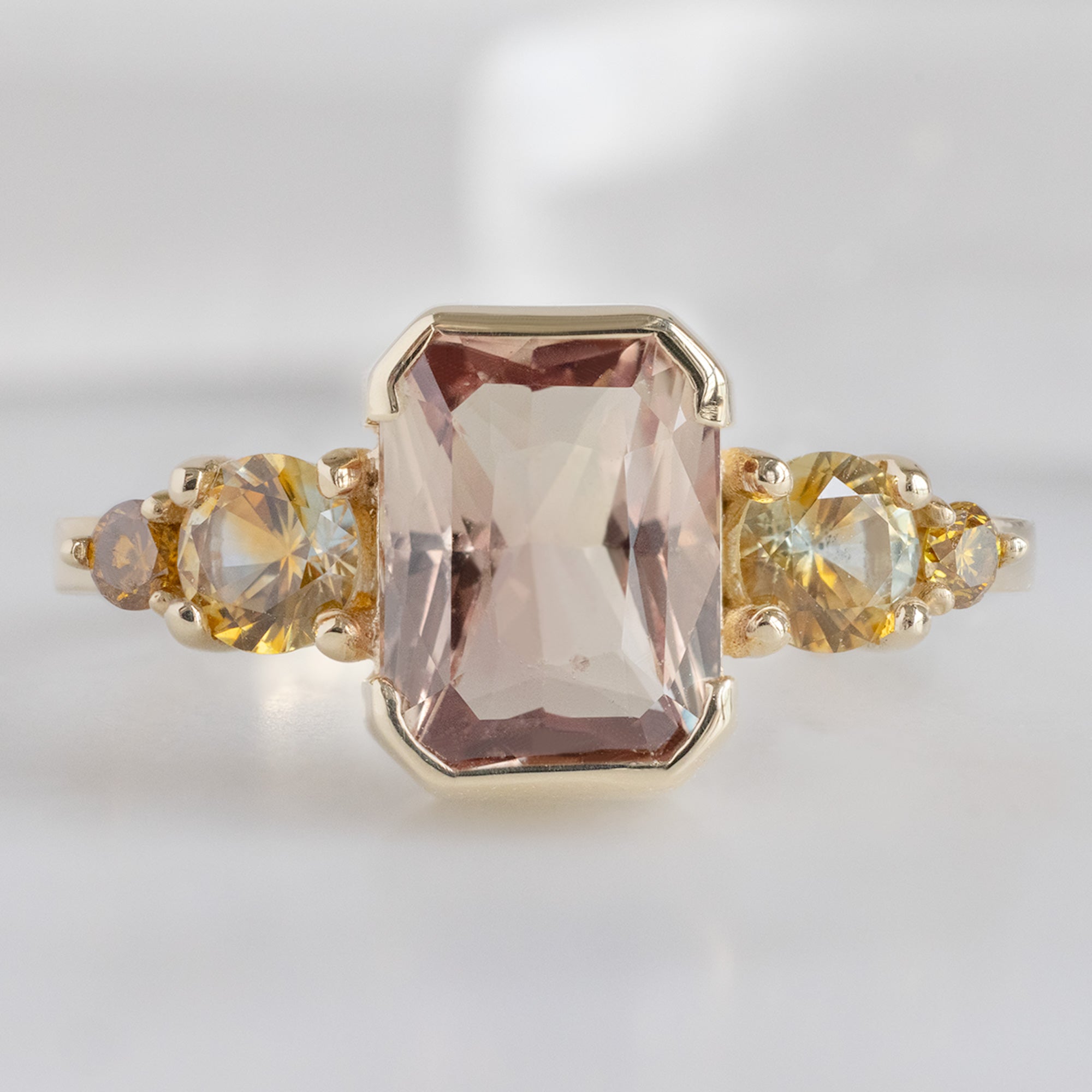Alexis Russell Engagement Rings The Watercolor Ring | 2.04ct Emerald Cut Peach Sapphire in 14K Yellow Gold