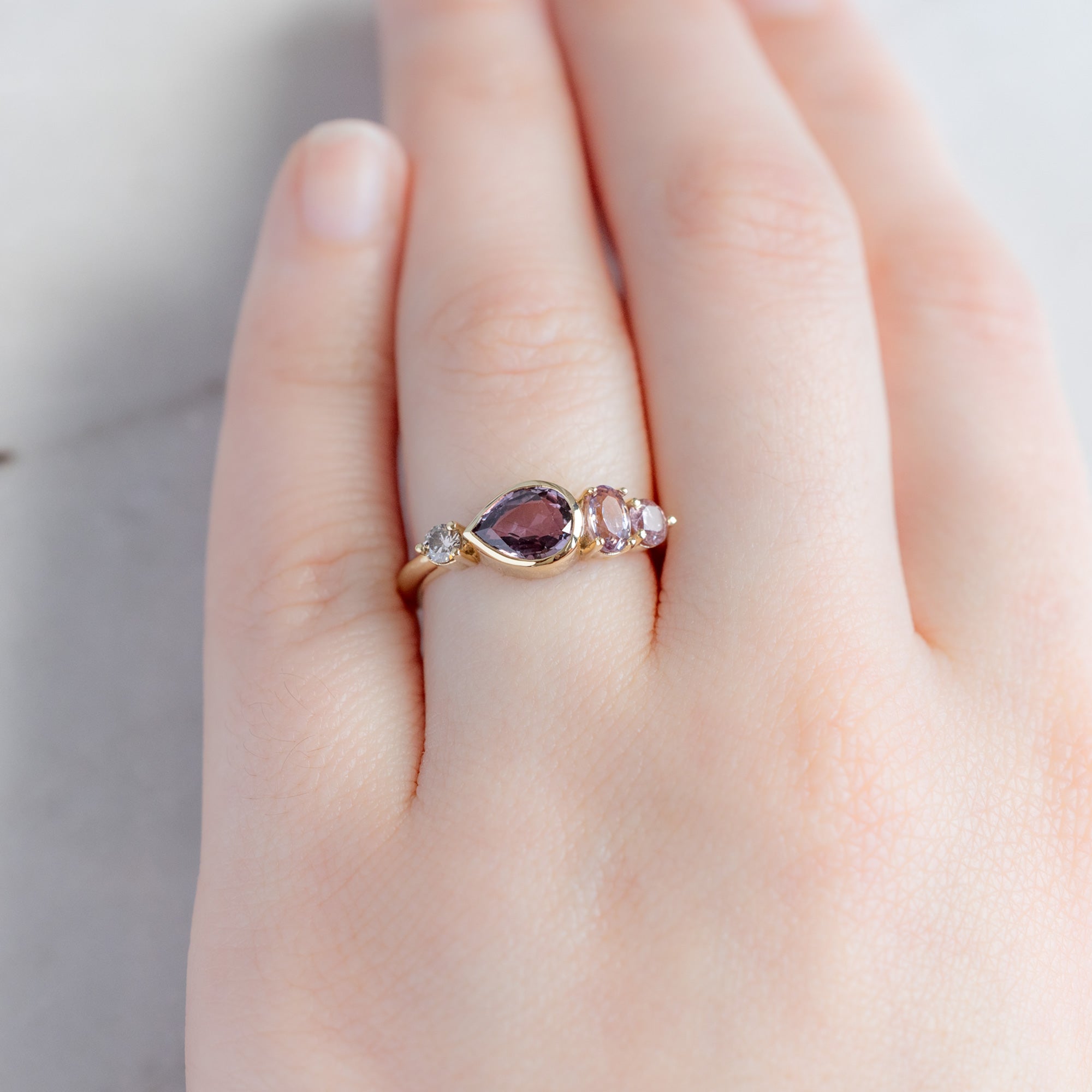 Alexis Russell Engagement Rings The Watercolor Line Ring | 1.27ct Pear Magenta Sapphire in 14K Yellow Gold