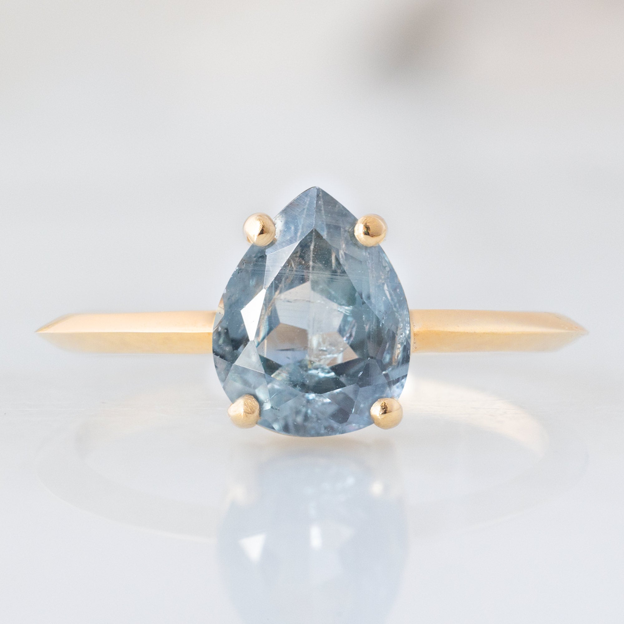 Alexis Russell Engagement Rings The Bryn Ring | 1.42ct Pear Cut Blue Sapphire in 14K Yellow Gold