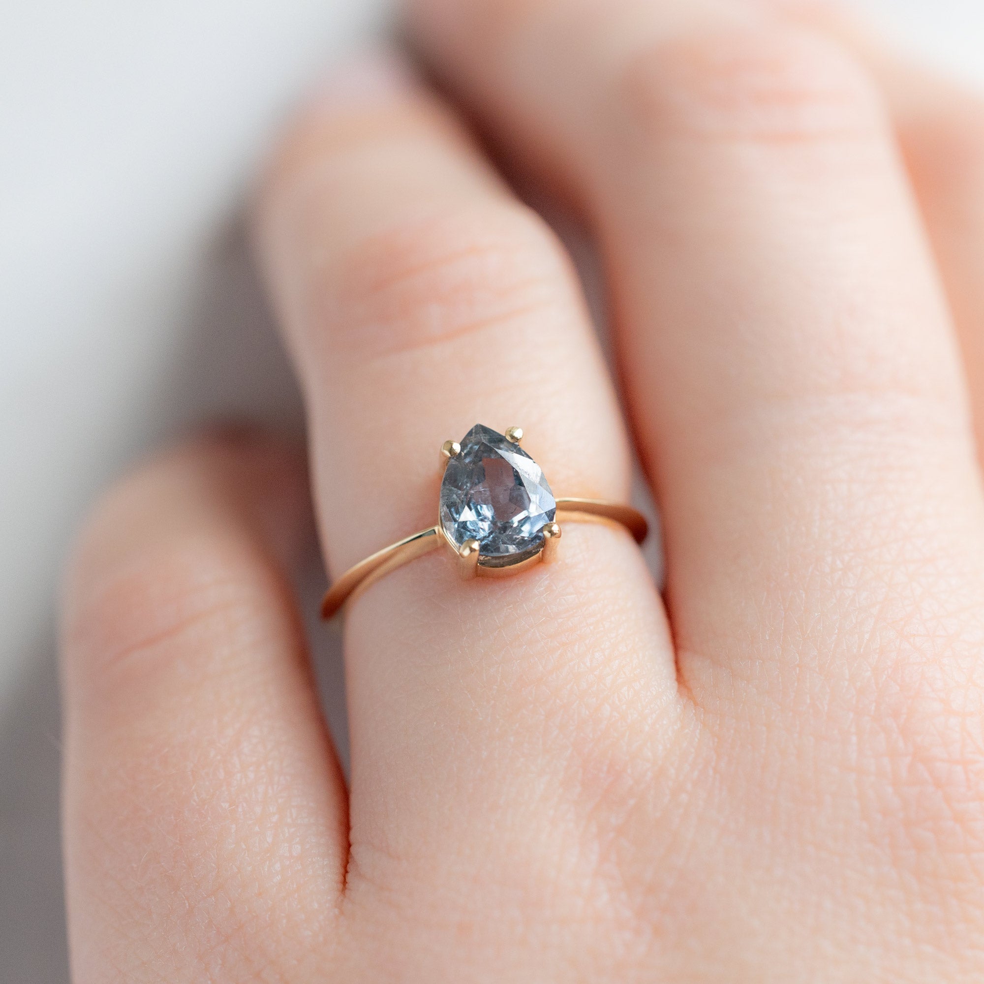 Alexis Russell Engagement Rings The Bryn Ring | 1.42ct Pear Cut Blue Sapphire in 14K Yellow Gold