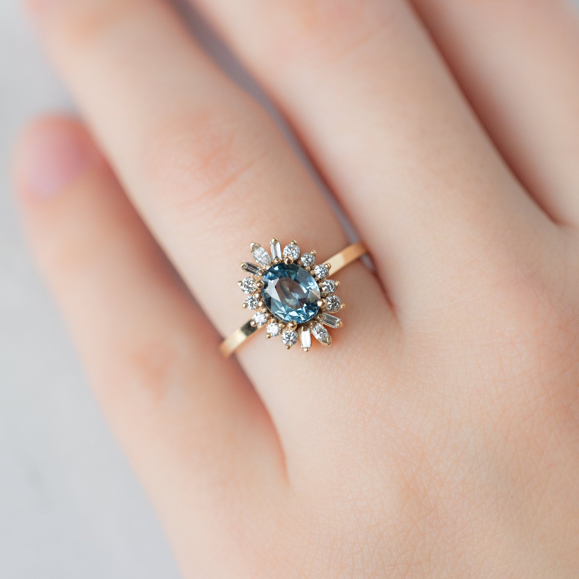 Alexis Russell Engagement Rings The Camellia Ring | 1.32ct Oval Blue Montana Sapphire in 14K Yellow Gold
