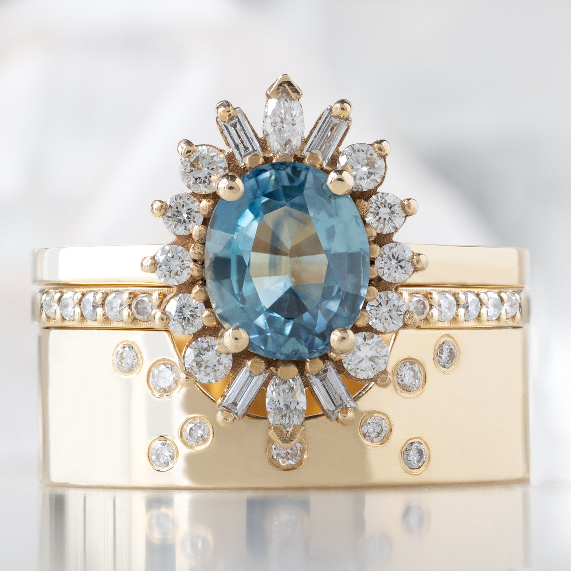 Alexis Russell Engagement Rings The Camellia Ring | 1.32ct Oval Blue Montana Sapphire in 14K Yellow Gold