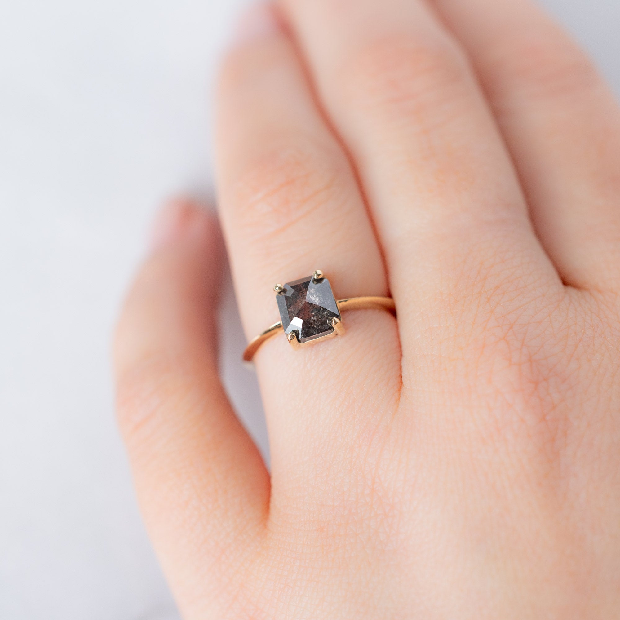 Alexis Russell Engagement Rings The Bryn Ring | 1.46ct Emerald Cut Salt and Pepper Diamond in 14K Yellow Gold