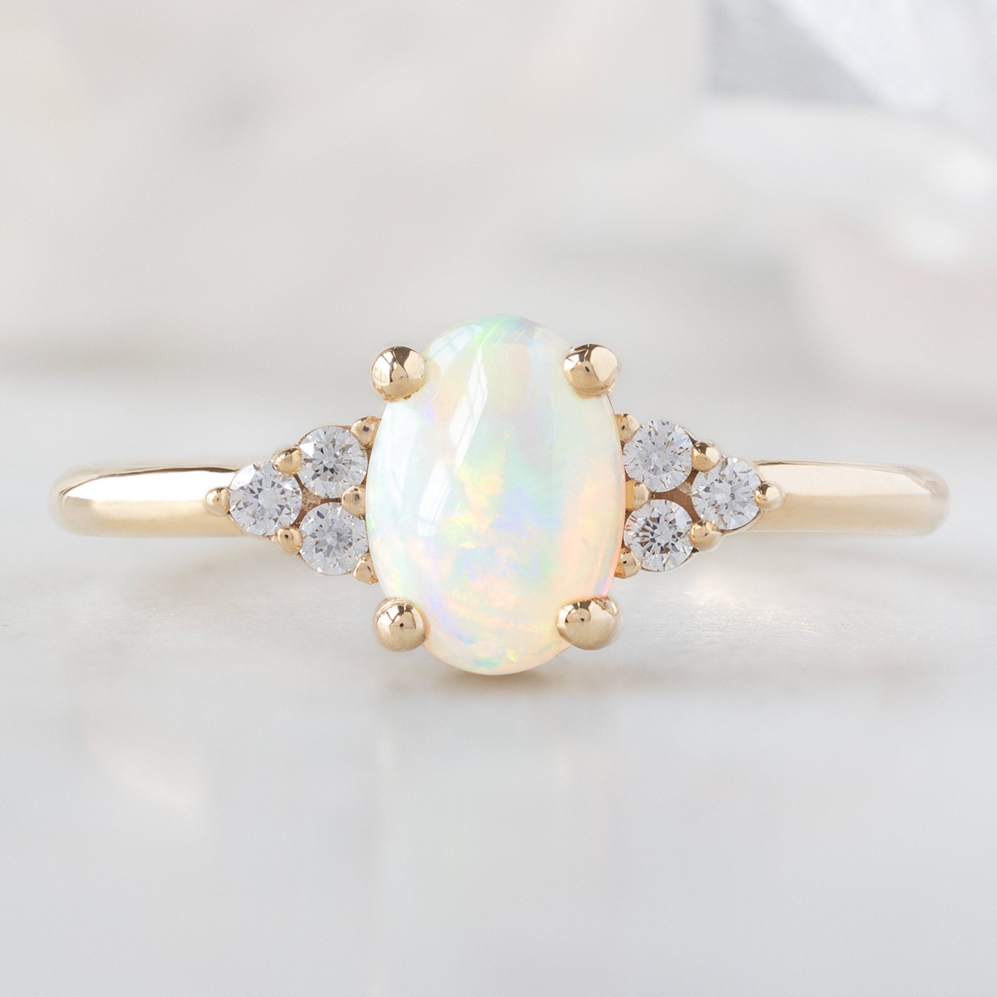 Alexis Russell  Engagement Rings The Ivy Ring | 0.96ct Oval Australian Opal in 14K Yellow Gold