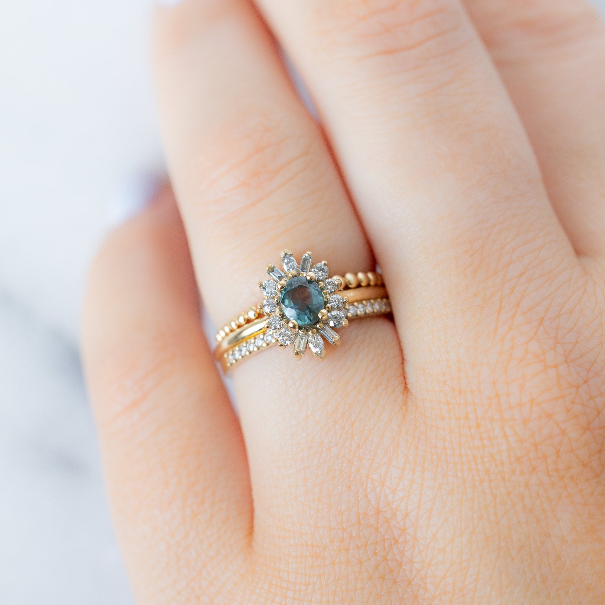 Alexis Russell  Engagement Rings The Camellia Ring | 0.81ct Oval Blue Montana Sapphire in 14K Yellow Gold