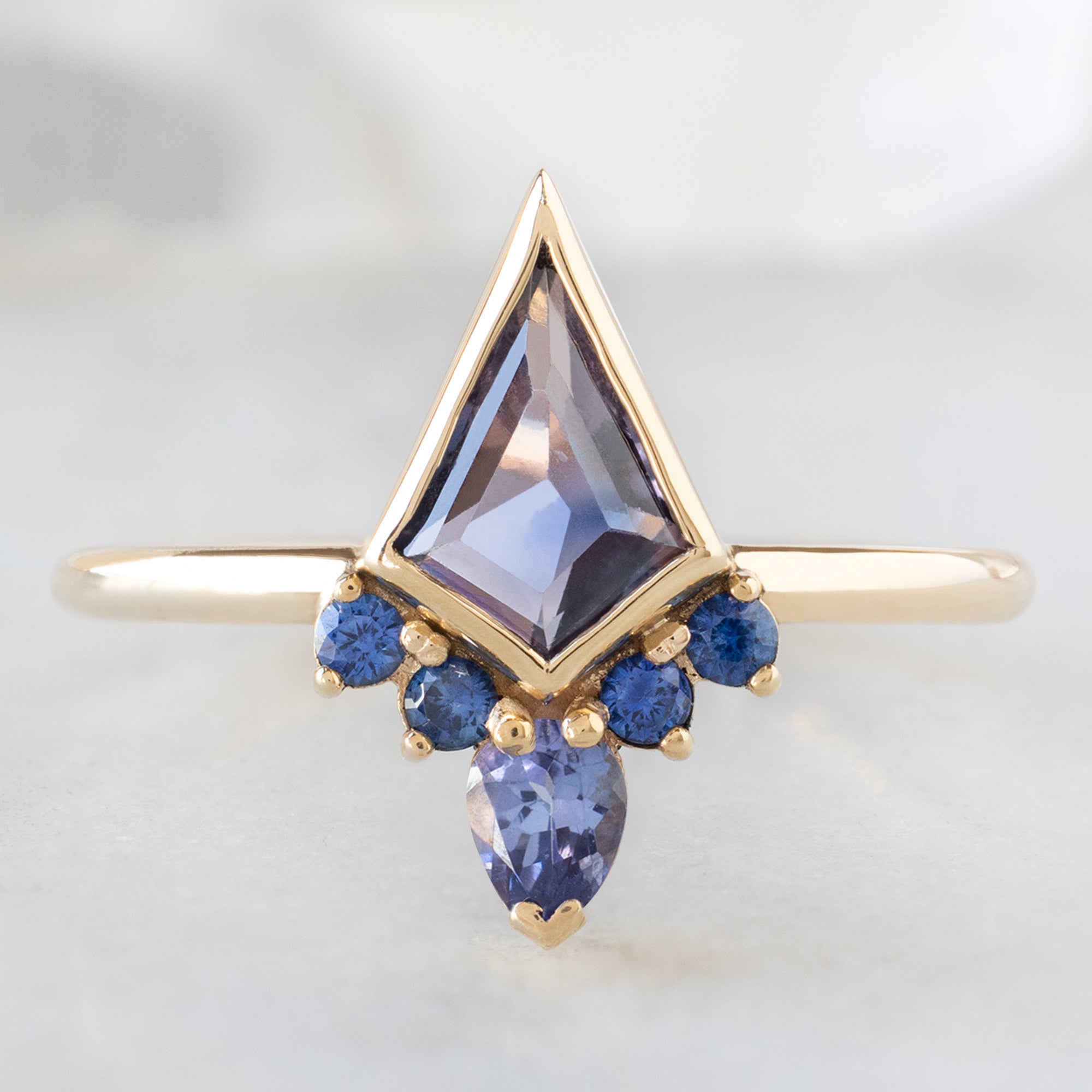 Alexis Russell  Engagement Rings The Watercolor Aster Ring | 0.83ct Violet Kite Sapphire in 14K Yellow Gold