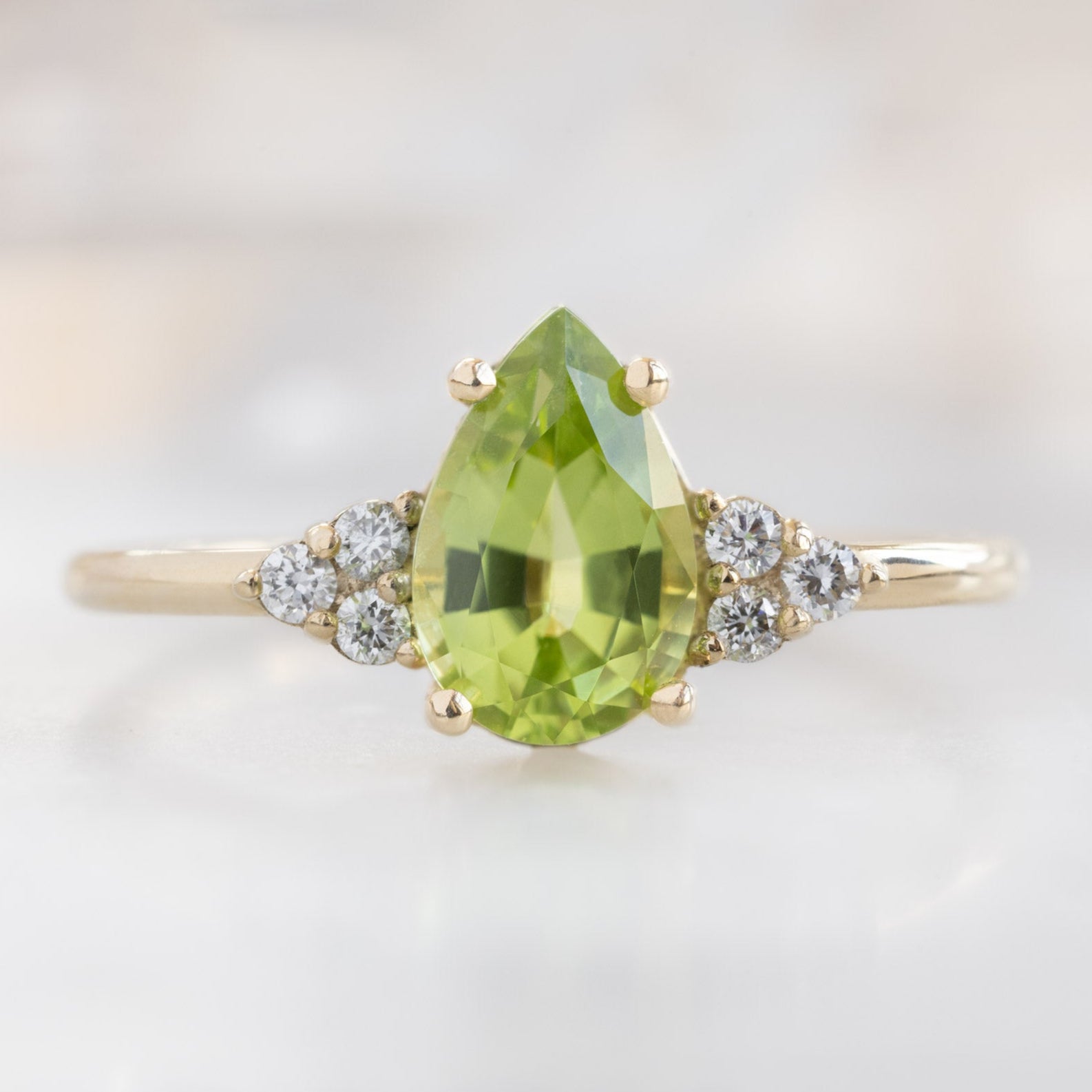Alexis Russell  Engagement Rings The Ivy Ring | 0.73ct Pear Peridot in 14K Yellow Gold
