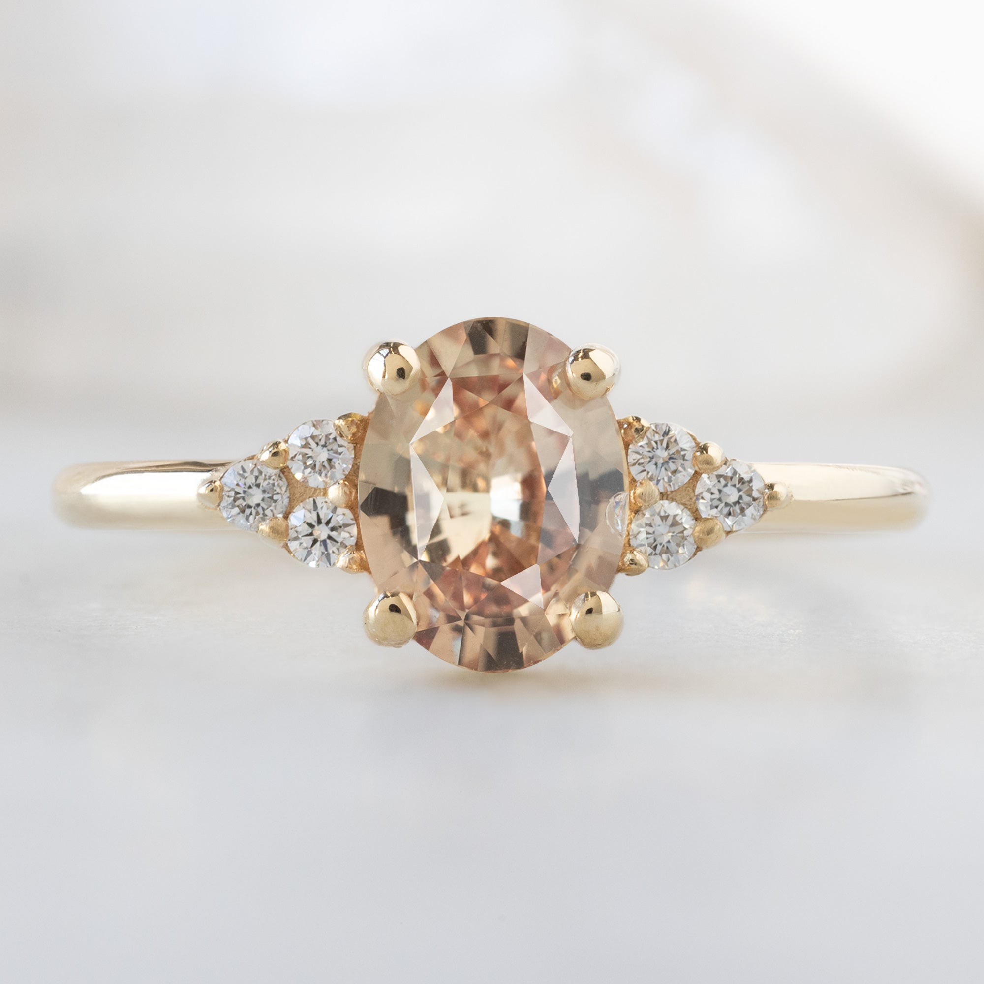 Alexis Russell  Engagement Rings The Ivy Ring | 1.13ct Oval Peach Sapphire in 14K Yellow Gold