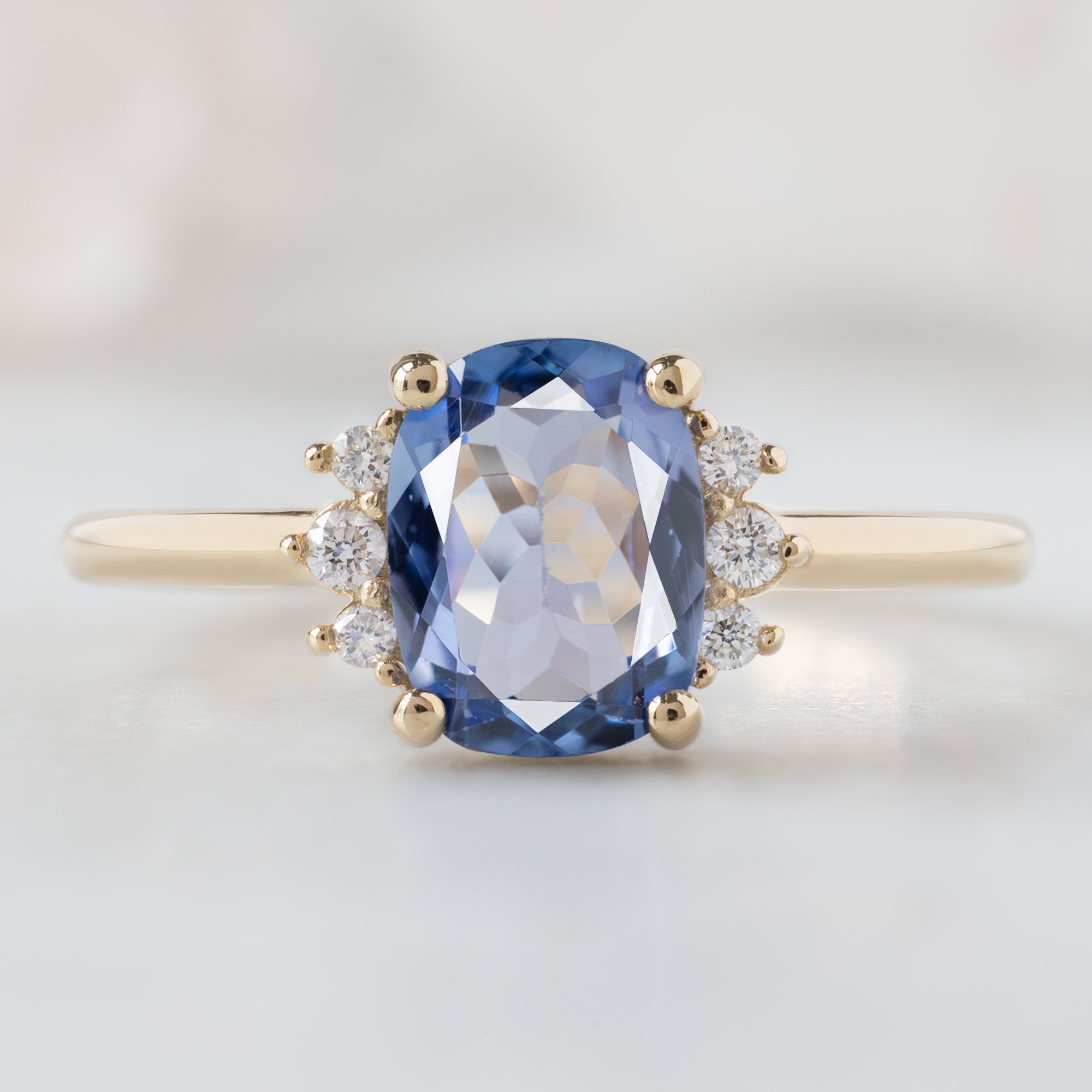 Alexis Russell  Engagement Rings The Sunflower Ring | 1.02ct Cushion Cut Tanzanite in 14K Yellow Gold