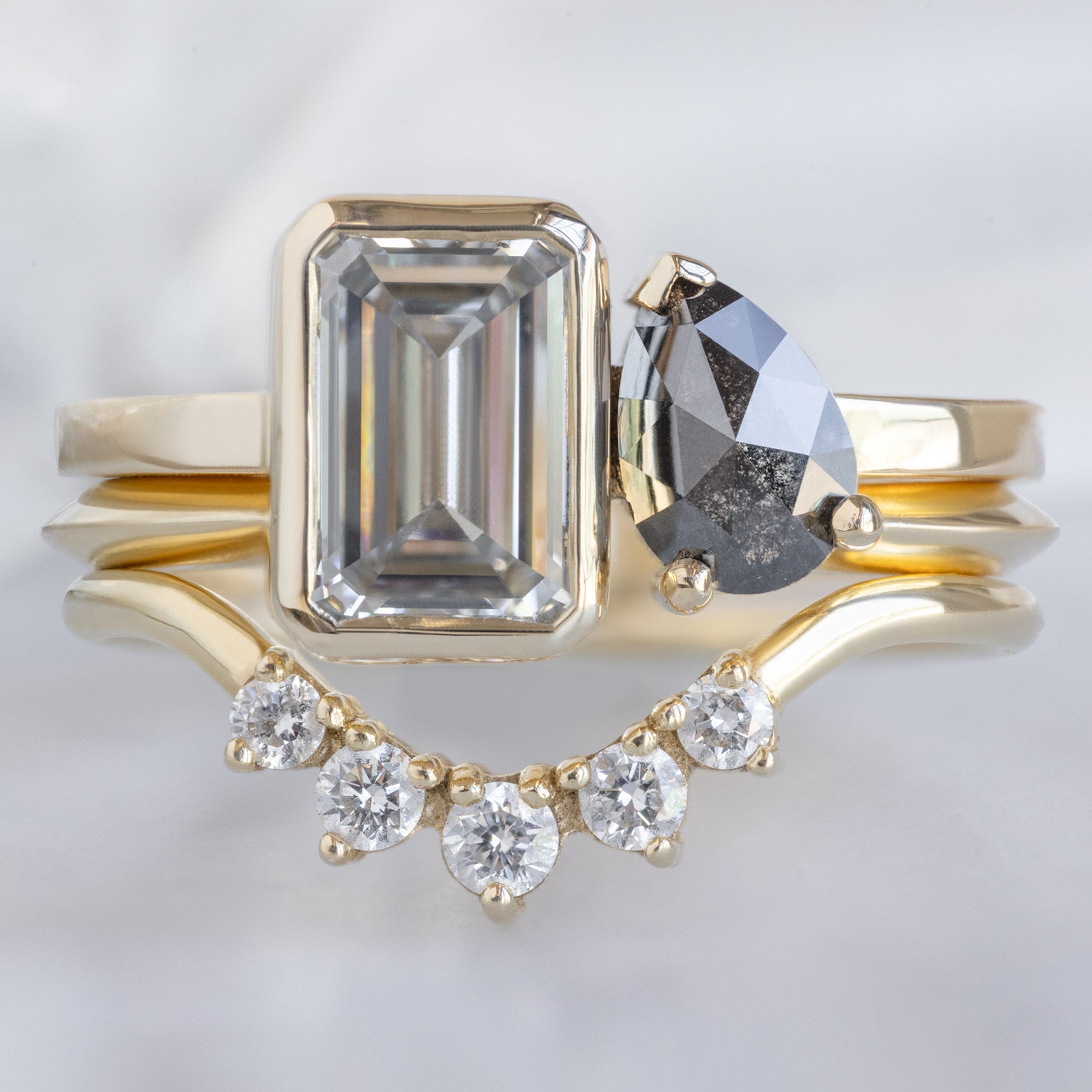 buy:the-you-and-me-ring-1-5ct-emerald-cut-lab-grown-white-diamond-in-14k-yellow-gold,gold-open-cuff-knife-edge-stacking-band-14k-yellow-gold,round-white-diamond-sunburst-stacking-band-14k-or-18k-yellow-gold