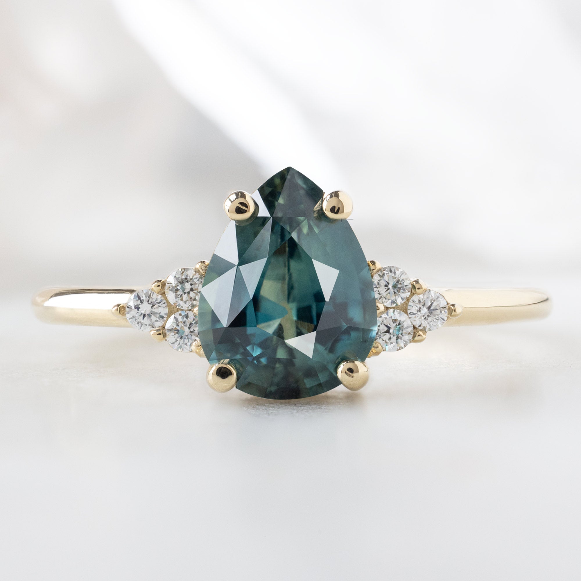 Alexis Russell  Engagement Rings The Ivy Ring | 1.37ct Pear Montana Sapphire in 14K Yellow Gold