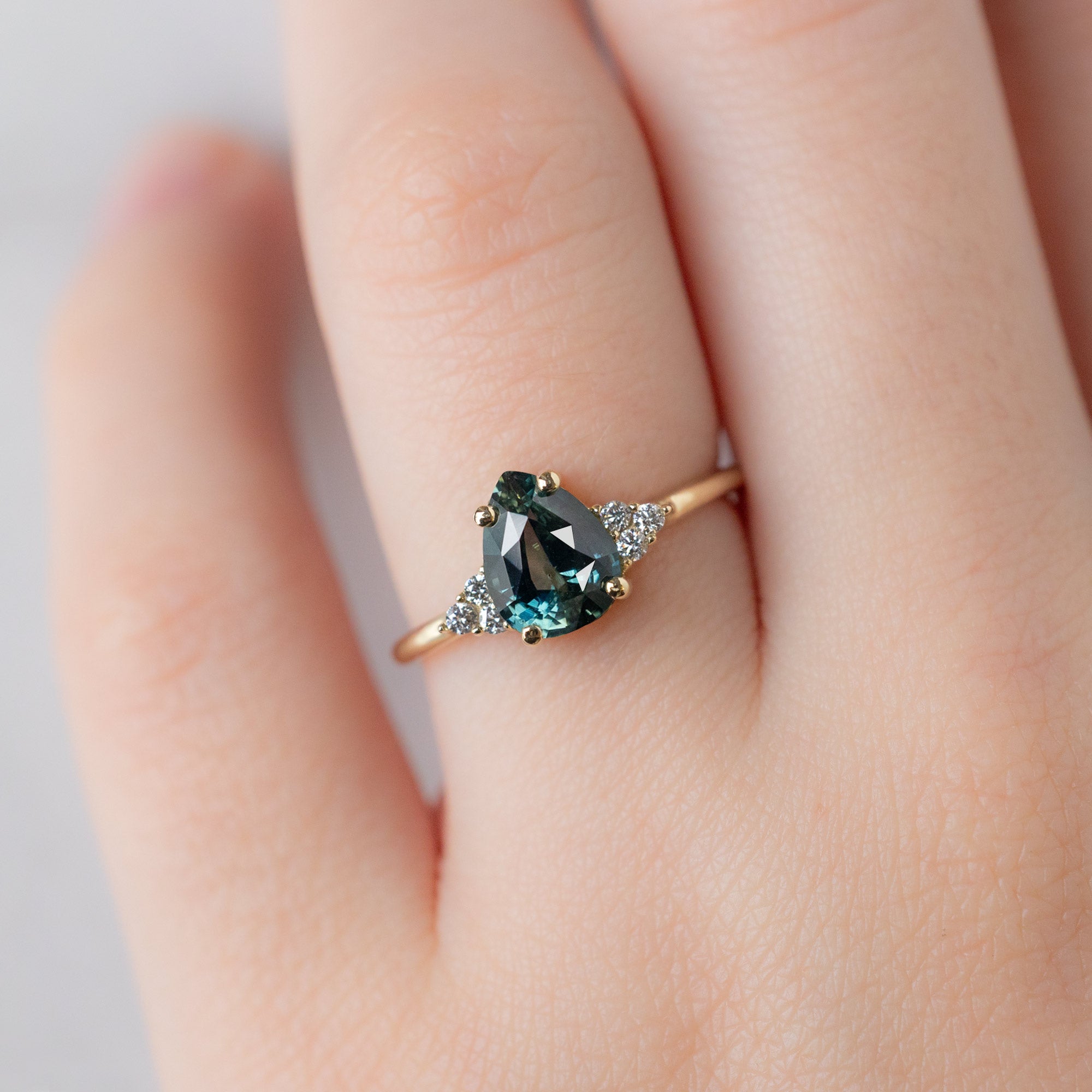 Alexis Russell  Engagement Rings The Ivy Ring | 1.37ct Pear Montana Sapphire in 14K Yellow Gold