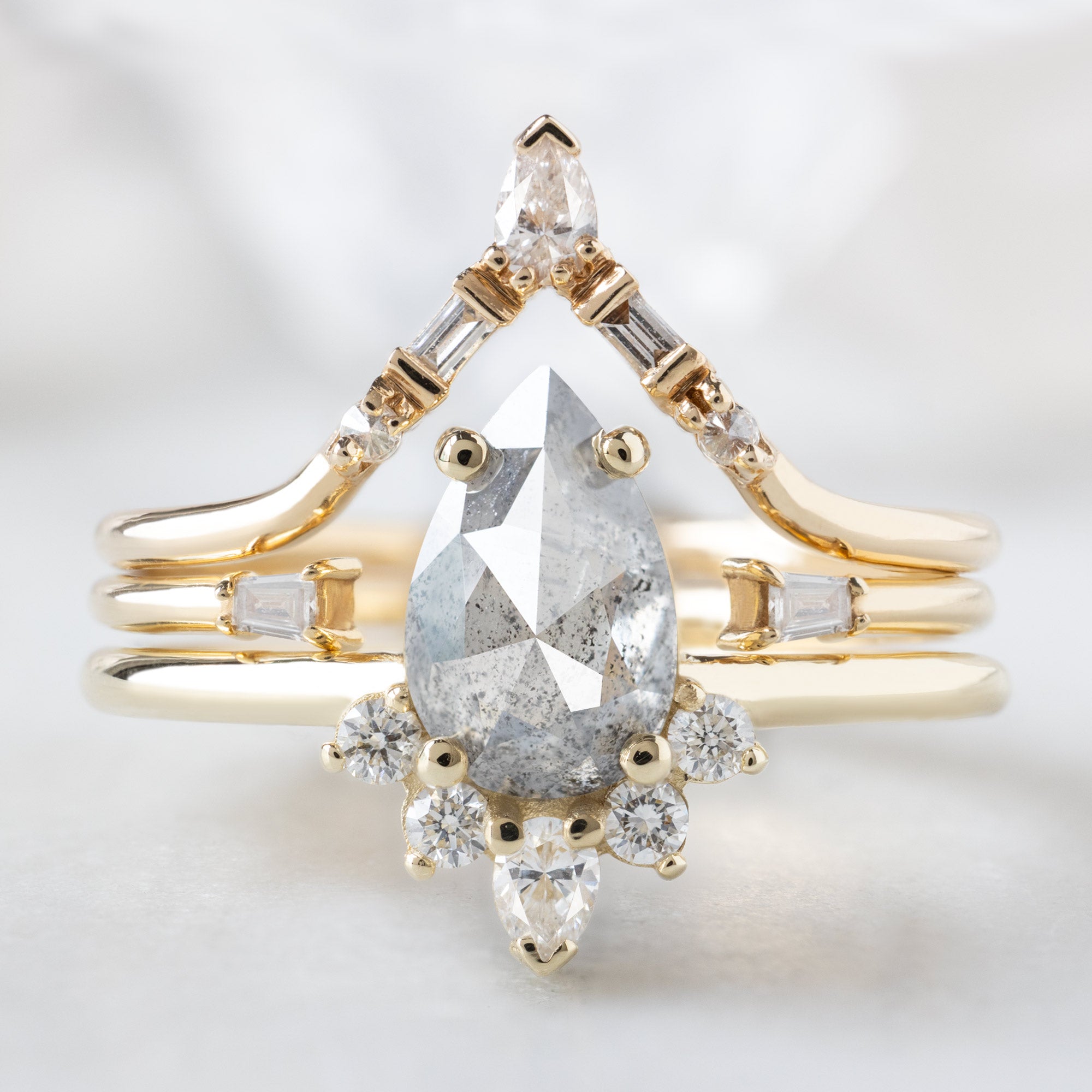 buy:white-diamond-tiara-stacking-band-14k-or-18k-yellow-gold,open-cuff-baguette-white-diamond-stacking-band-14k-or-18k-yellow-gold,the-aster-ring-1-10ct-pear-salt-and-pepper-diamond-in-14k-yellow-gold