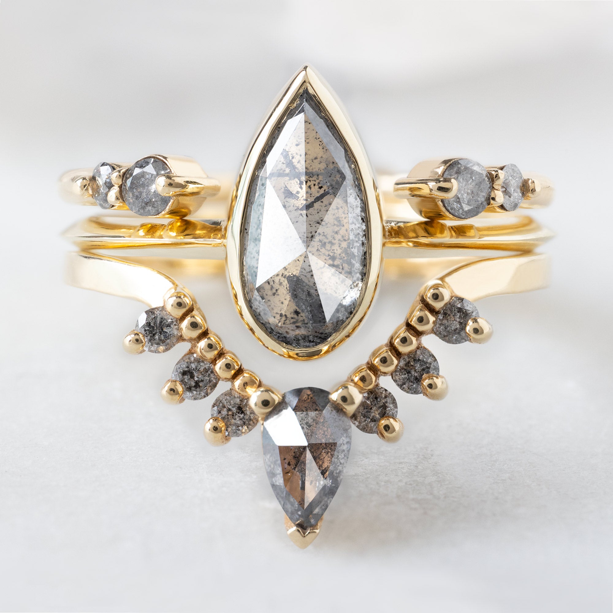 buy:the-luxe-open-cuff-salt-and-pepper-round-diamond-stacking-band-yellow-rose-or-white-gold,the-hazel-ring-1-30ct-pear-salt-and-pepper-diamond-in-14k-yellow-gold,salt-and-pepper-pear-diamond-sunburst-stacking-band-14k-gold