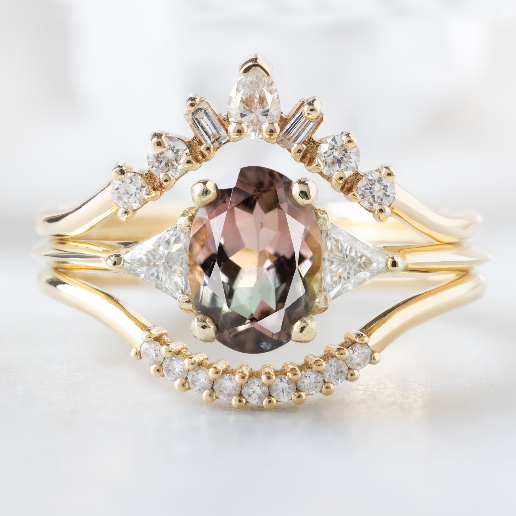 buy:geometric-white-diamond-sunburst-stacking-band-14k-or-18k-yellow-gold,the-jade-ring-82ct-oval-bicolor-tourmaline-in-14k-yellow-gold,white-diamond-pave-arc-stacking-band-14k-or-18k-yellow-gold