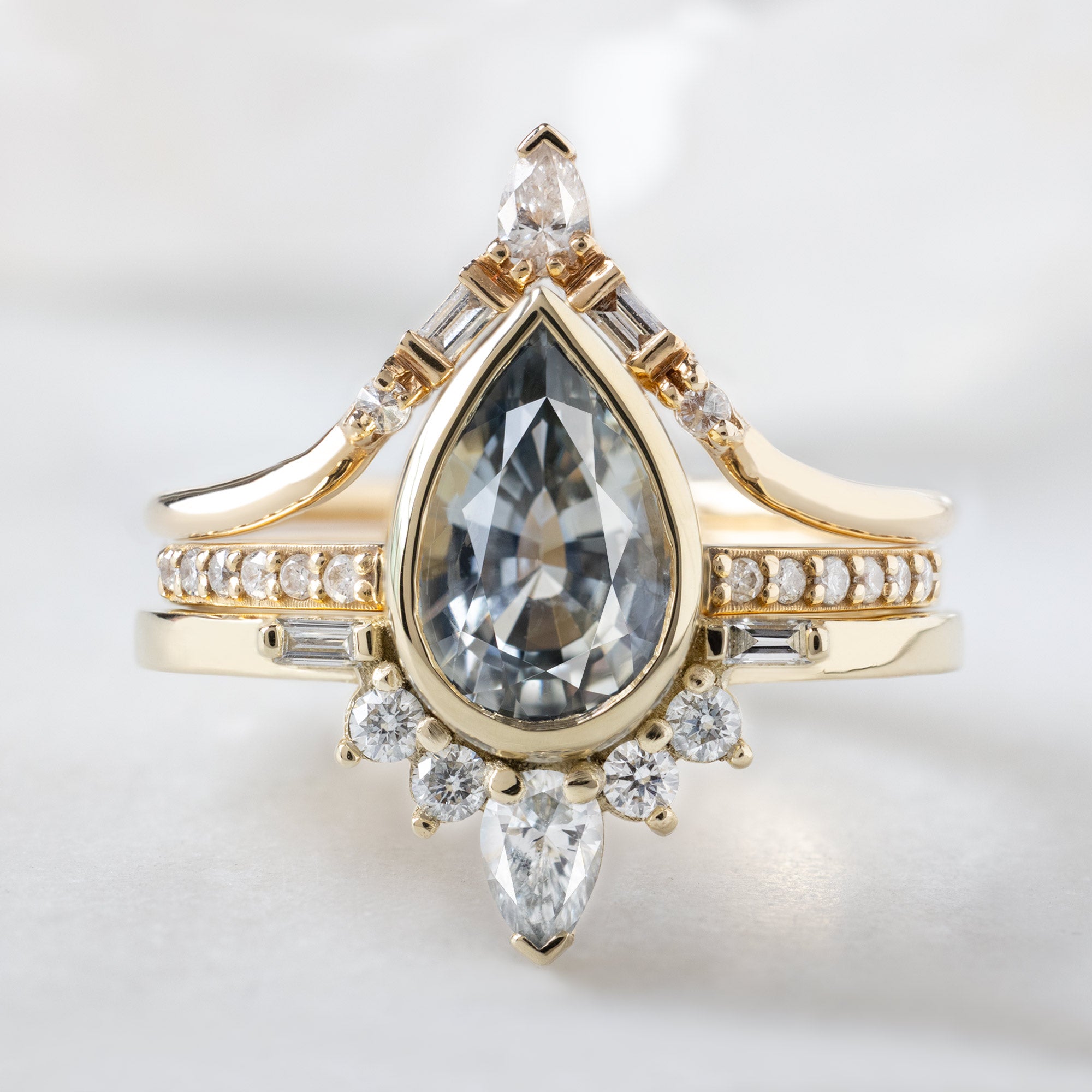 buy:white-diamond-tiara-stacking-band-14k-or-18k-yellow-gold,open-cuff-white-diamond-pave-stacking-band-14k-or-18k-yellow-gold,the-watercolor-posy-ring-1-96ct-pear-parti-sapphire-in-14k-yellow-gold