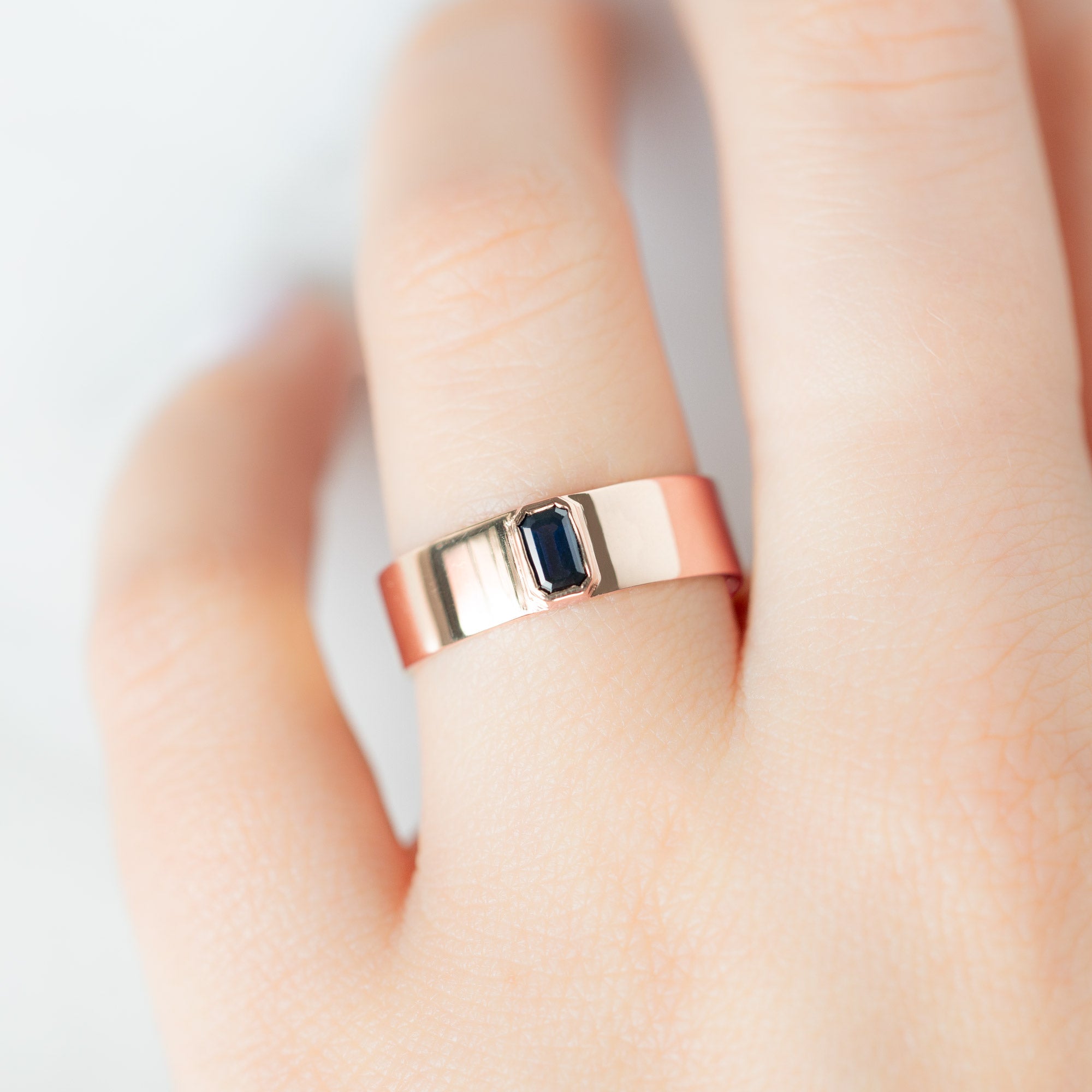 Alexis Russell Engagement Rings The Cigar Band with an Emerald-Cut Blue Sapphire | Yellow, Rose or White Gold