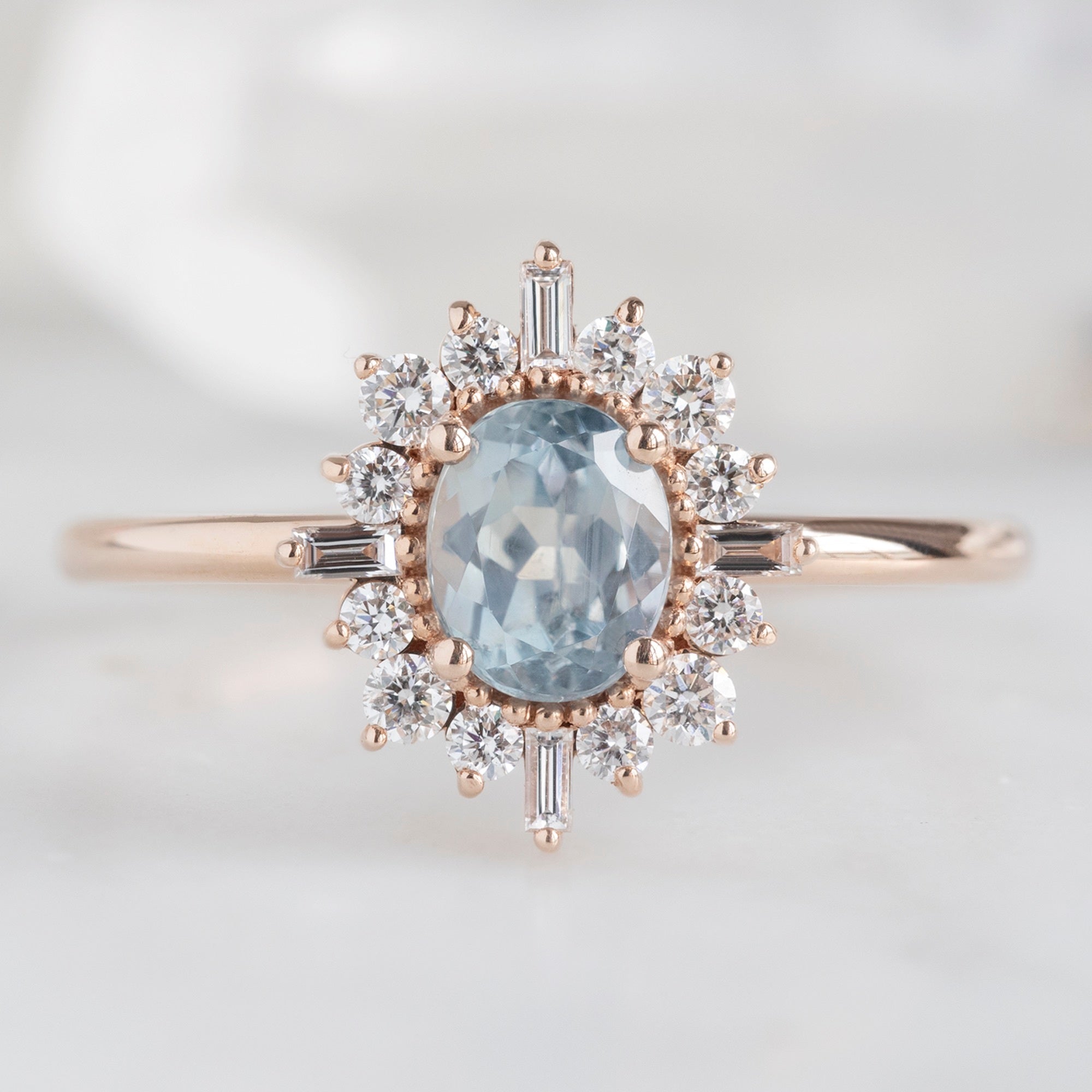 Alexis Russell Engagement Rings The Compass Ring | 0.87ct Oval Montana Sapphire in 14K Rose Gold