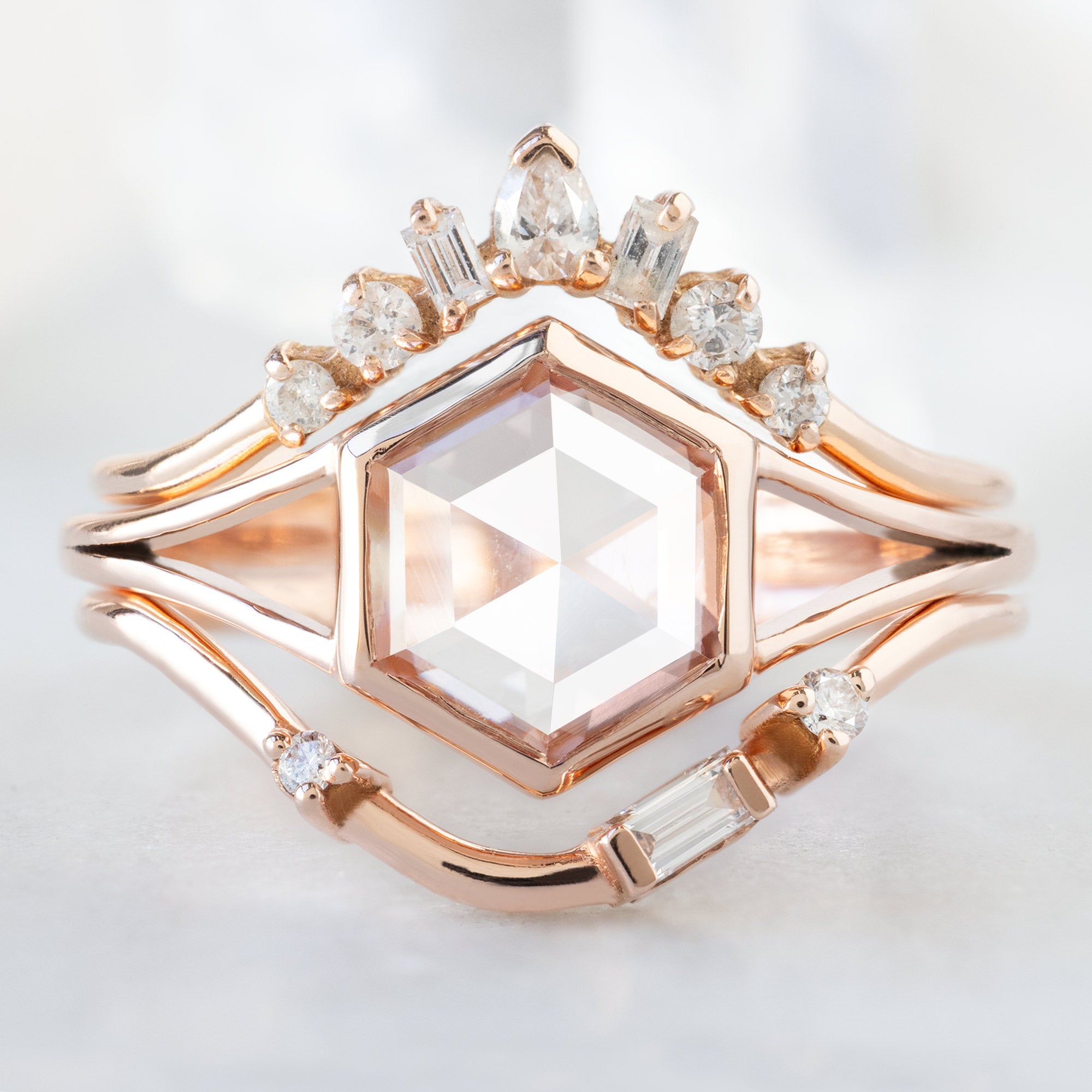 buy:geometric-white-diamond-sunburst-stacking-band-14k-or-18k-yellow-gold,the-magnolia-ring-1-14ct-lab-grown-pink-diamond-in-14k-rose-gold,asymmetrical-baguette-diamond-arc-stacking-band-in-14k-yellow-gold