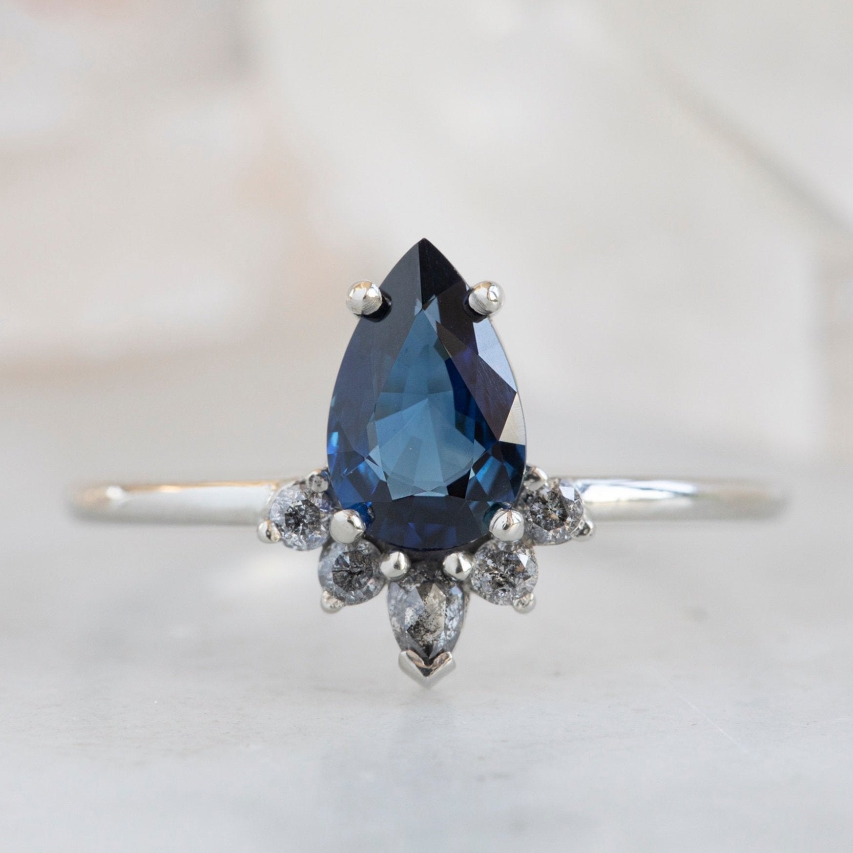 Alexis Russell Engagement Rings The Aster Ring | 0.90ct Pear Blue Sapphire in 14K White Gold