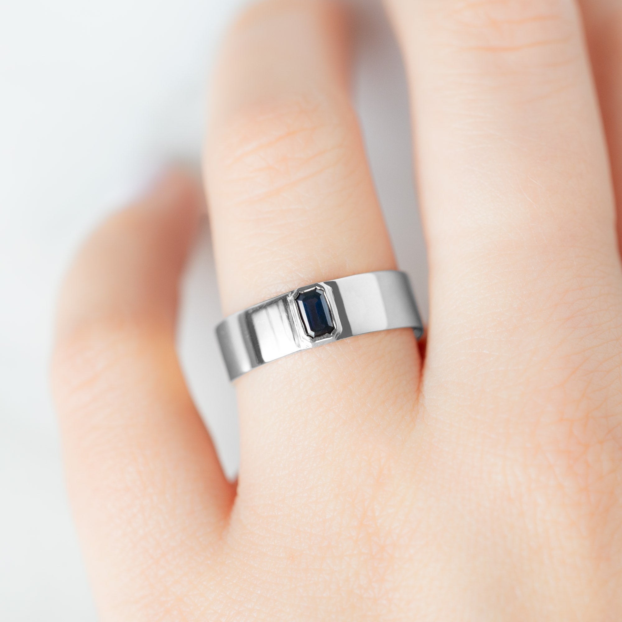 Alexis Russell Engagement Rings The Cigar Band with an Emerald-Cut Blue Sapphire | Yellow, Rose or White Gold