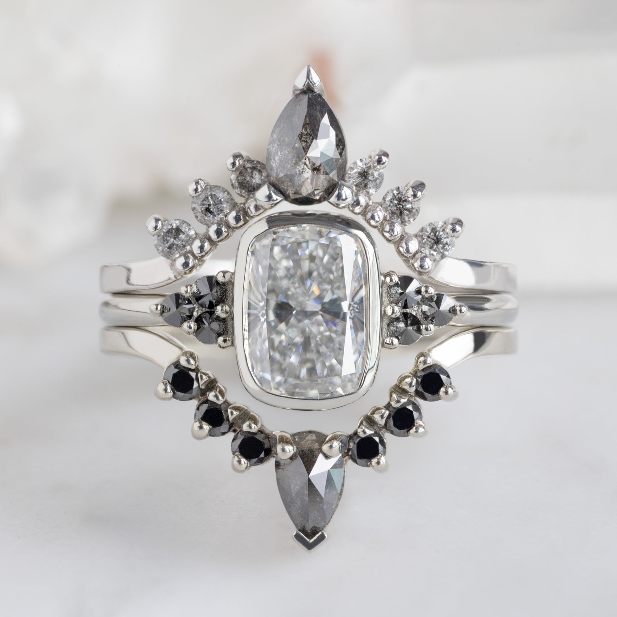 buy:black-and-salt-and-pepper-diamond-sunburst-stacking-band-14k-gold,the-ivy-ring-1-58ct-lab-grown-cushion-cut-white-diamond-in-14k-white-gold,pear-black-diamond-sunburst-stacking-band-14k-gold