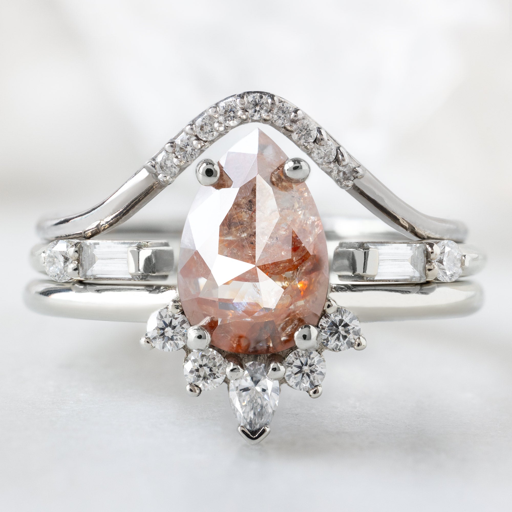 buy:white-diamond-pave-peak-stacking-band-14k-or-18k-yellow-gold,the-luxe-open-cuff-white-baguette-diamond-stacking-band-yellow-rose-or-white-gold,the-aster-ring-1-15ct-pear-red-diamond-in-14k-white-gold