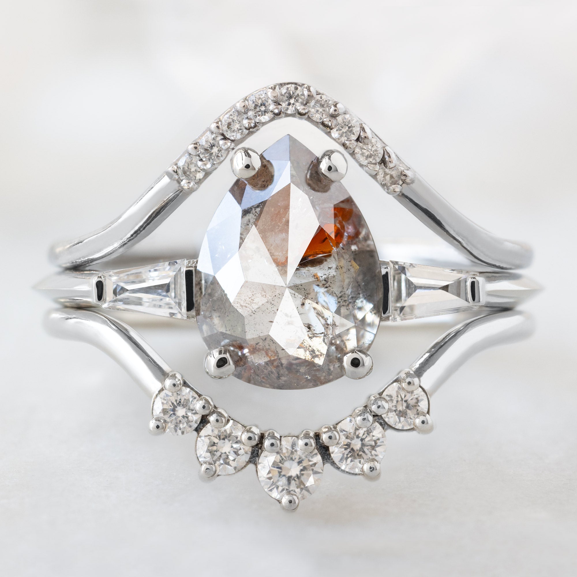 buy:white-diamond-pave-peak-stacking-band-14k-or-18k-yellow-gold,the-ash-ring-1-07ct-pear-red-diamond-in-14k-white-gold,round-white-diamond-sunburst-stacking-band-14k-or-18k-yellow-gold