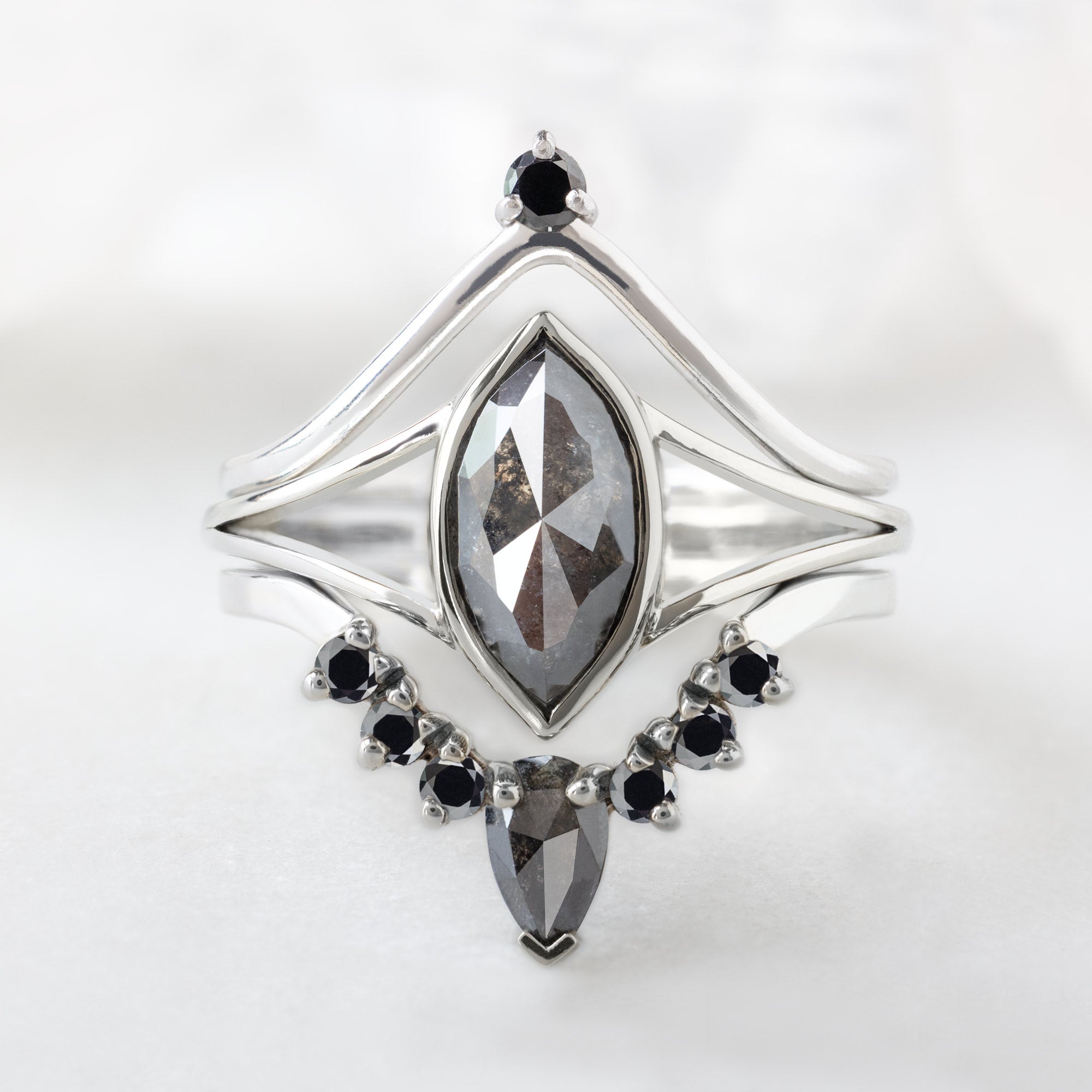 buy:black-diamond-crown-stacking-band-14k-or-18k-rose-gold,the-magnolia-ring-1-47ct-marquise-black-diamond-in-14k-white-gold,pear-black-diamond-sunburst-stacking-band-14k-gold