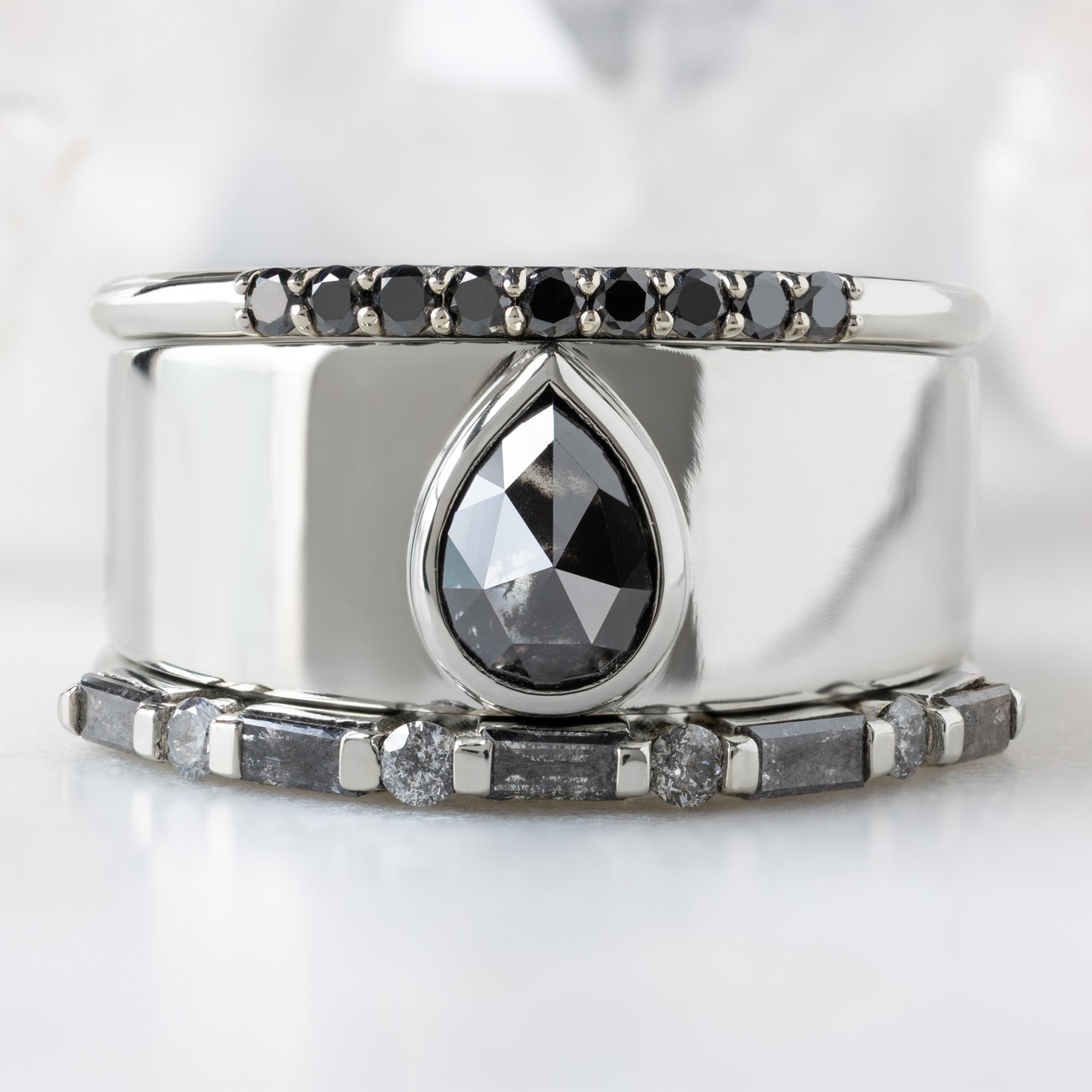 buy:the-luxe-ombre-diamond-pave-wedding-band-yellow-rose-or-white-gold,the-cigar-ring-90ct-pear-black-diamond-in-14k-white-gold,the-luxe-baguette-salt-and-pepper-diamond-eternity-band-yellow-rose-or-white-gold