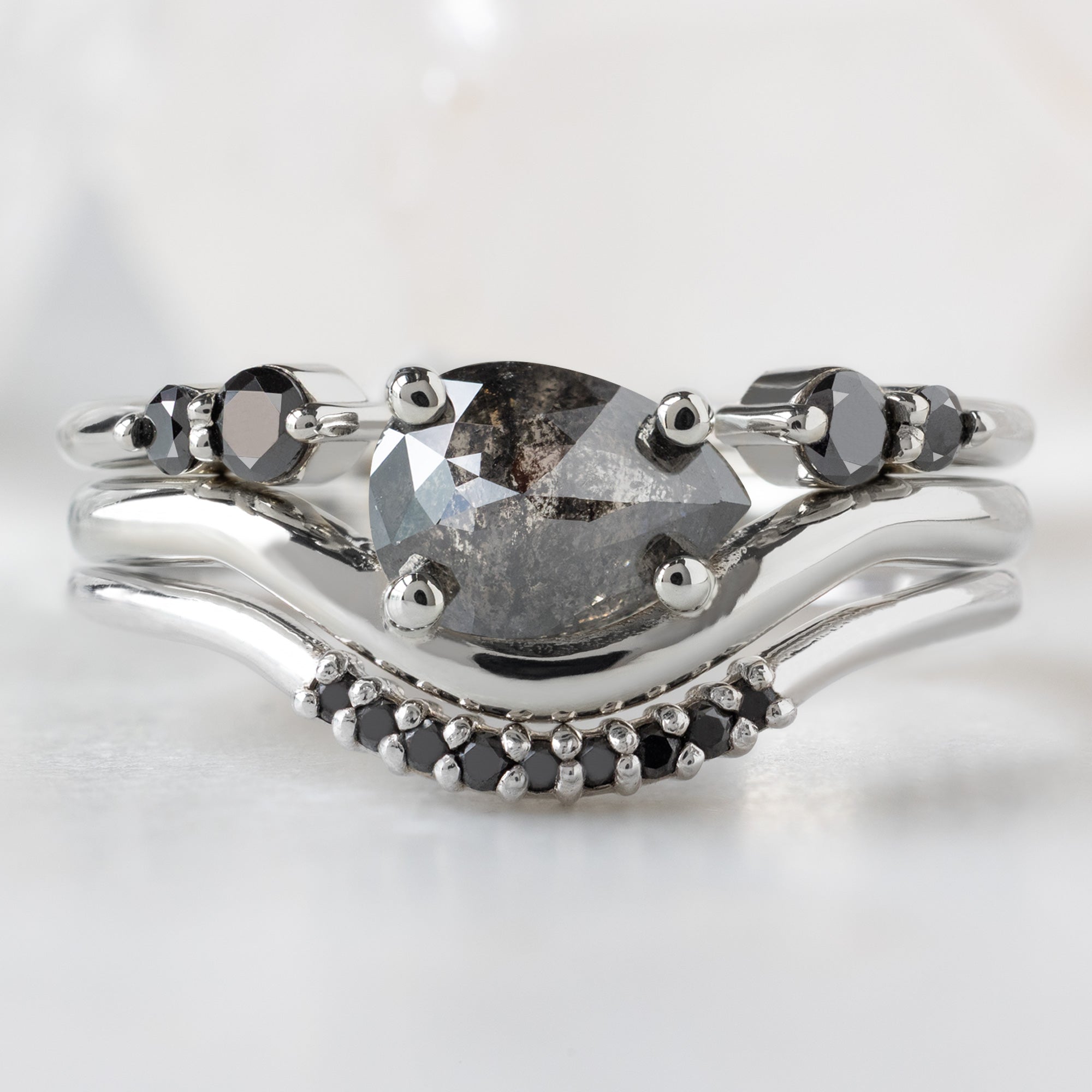 buy:the-luxe-open-cuff-black-round-diamond-stacking-band-yellow-rose-or-white-gold,the-wave-ring-83ct-pear-black-diamond-in-14k-white-gold,black-diamond-pave-arc-stacking-band-14k-or-18k-rose-gold