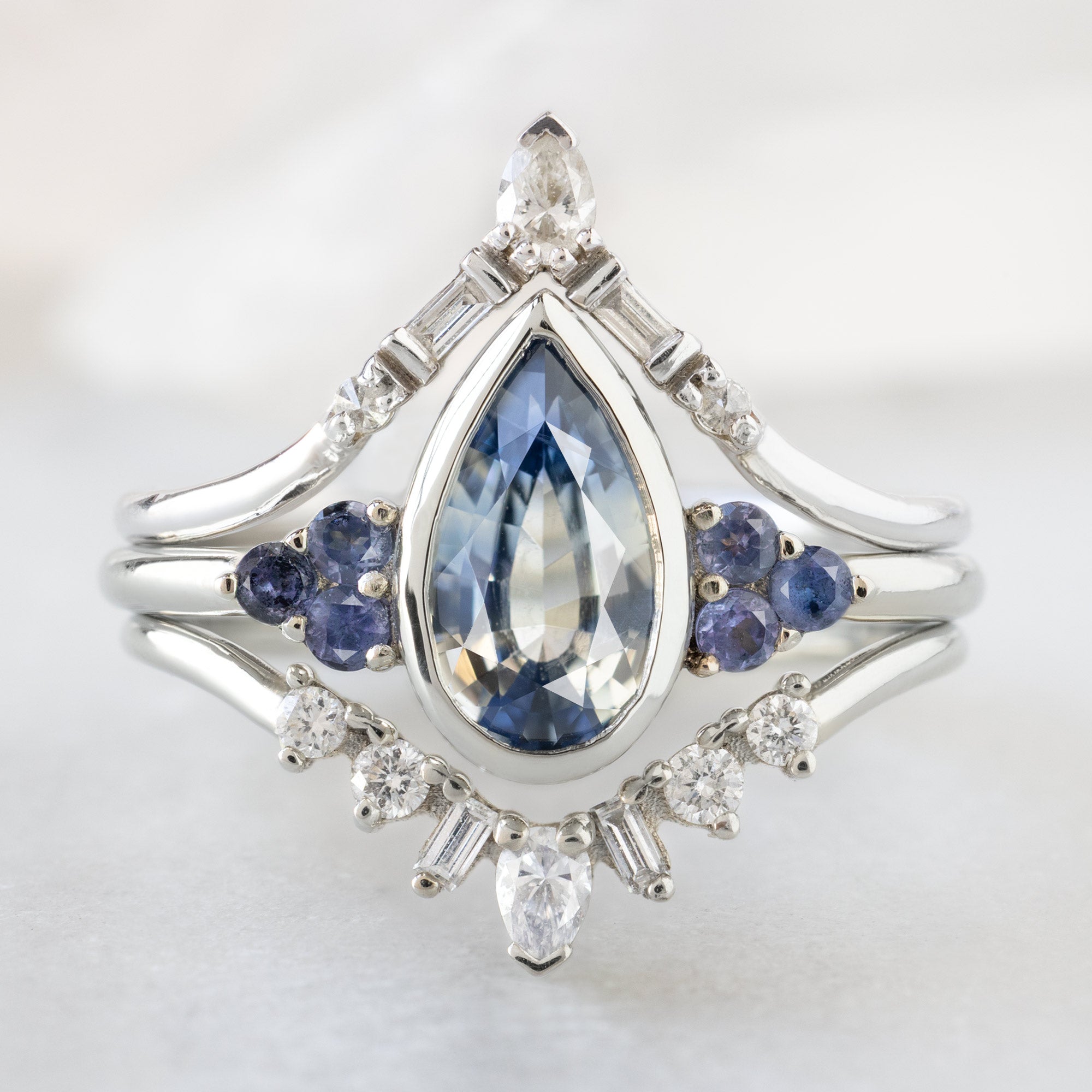 buy:white-diamond-tiara-stacking-band-14k-or-18k-yellow-gold,the-watercolor-ivy-ring-1-35ct-pear-parti-sapphire-in-14k-white-gold,geometric-white-diamond-sunburst-stacking-band-14k-or-18k-yellow-gold